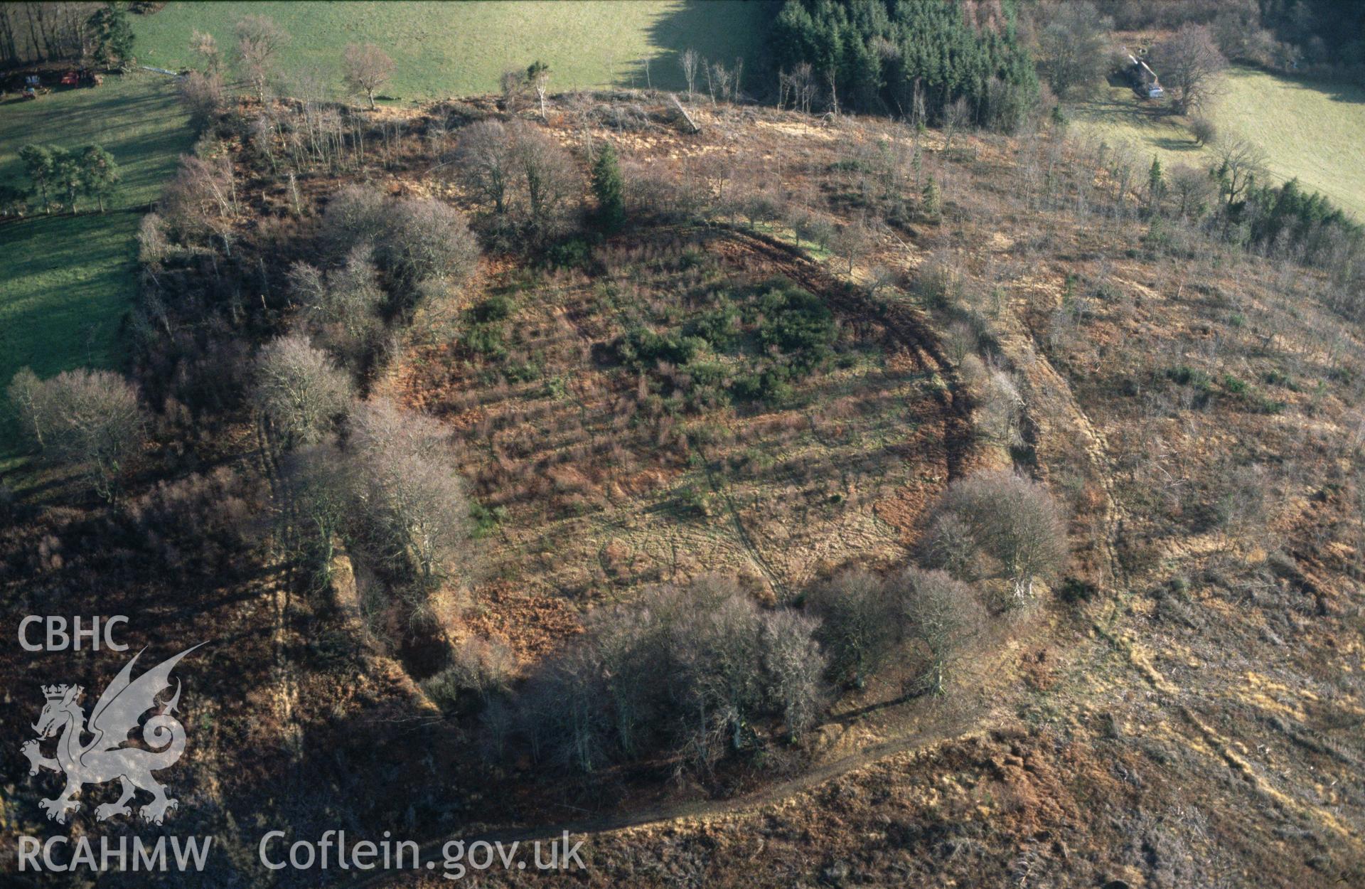 Slide of RCAHMW colour oblique aerial photograph of Castle Ring, Pen Offa, taken by C.R. Musson, 27/12/1996.