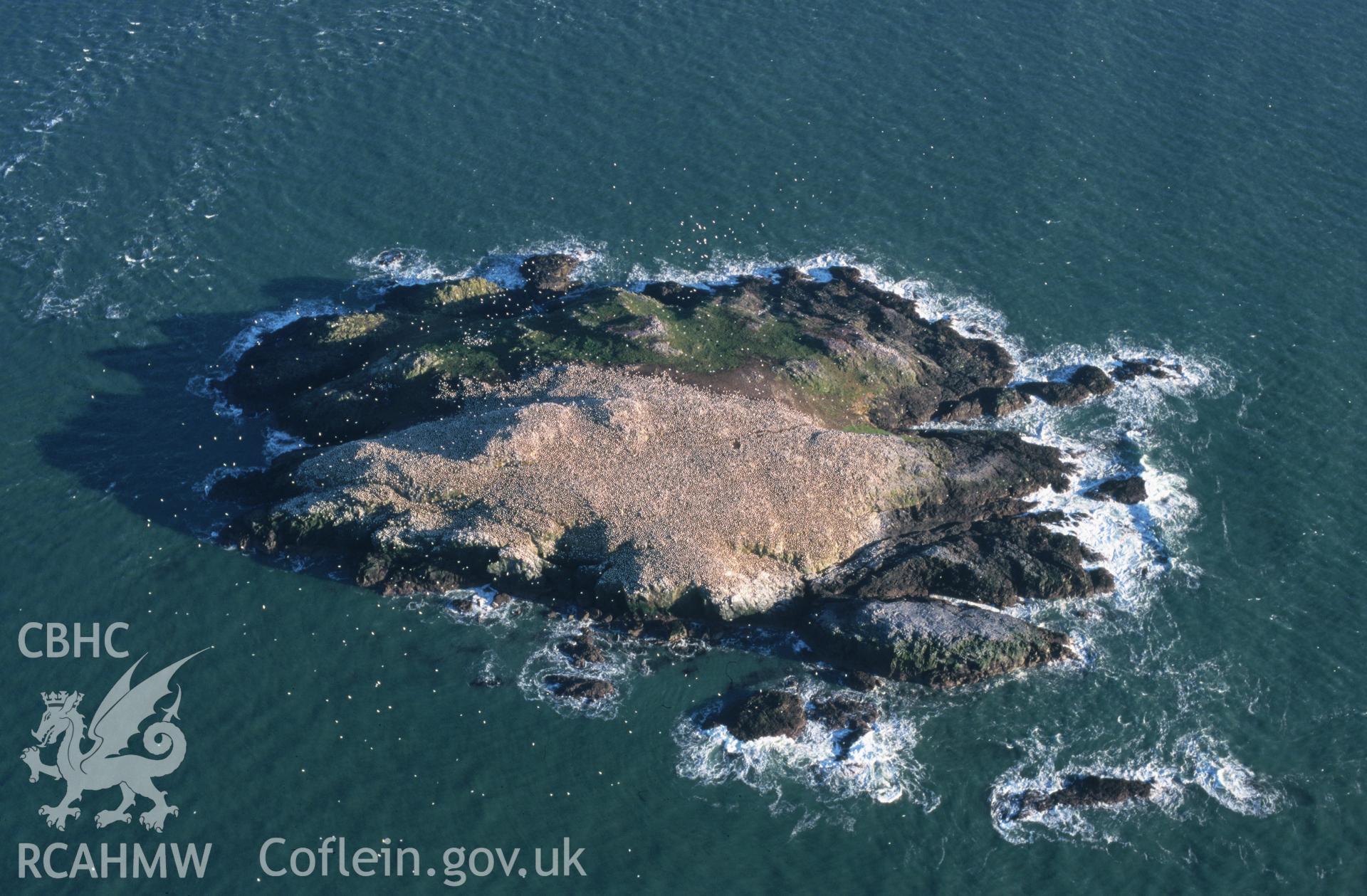 Slide of RCAHMW colour oblique aerial photograph of Grassholm Island, taken by T.G. Driver, 14/2/2001.