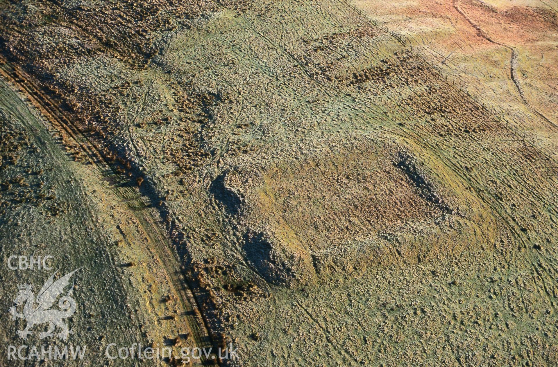 Slide of RCAHMW colour oblique aerial photograph of Pen Y Crogben Roman Signal Station, taken by C.R. Musson, 20/12/1998.