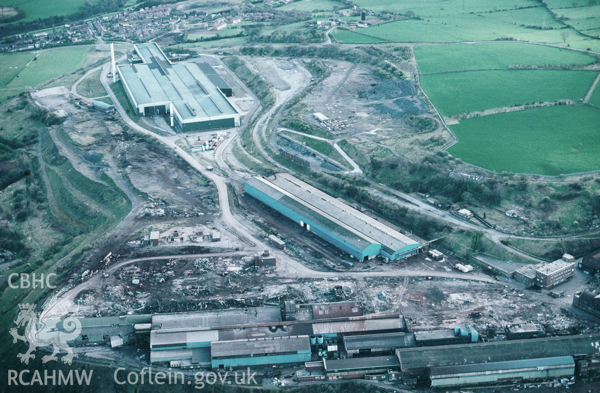 Slide of RCAHMW colour oblique aerial photograph of Brymbo Steelworks, taken by C.R. Musson, 4/4/1993.