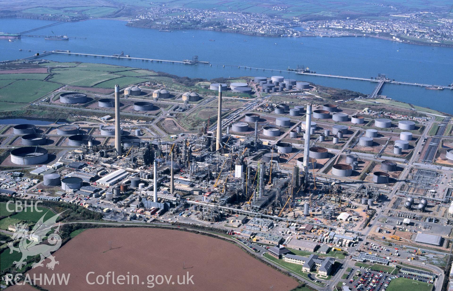 Slide of RCAHMW colour oblique aerial photograph of Rhoscrowther Oil Refinery, taken by C.R. Musson, 13/4/1995.