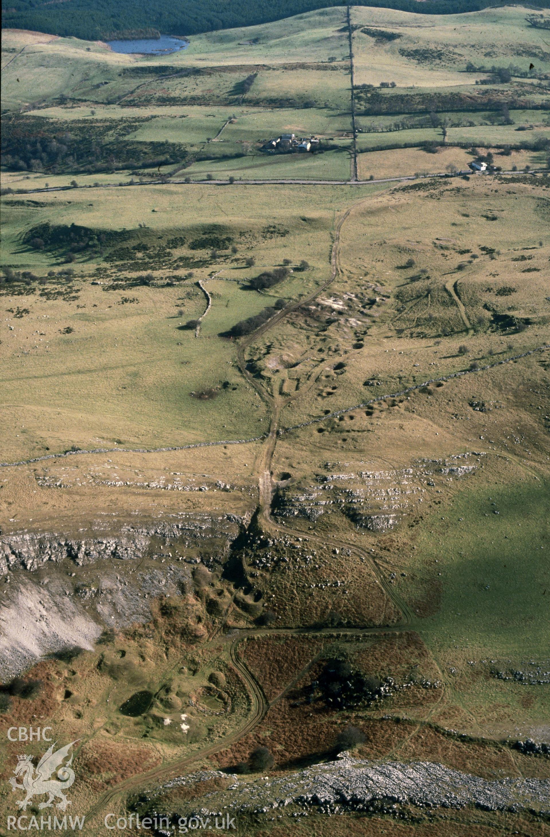 Slide of RCAHMW colour oblique aerial photograph of Belgrave Mine, taken by C.R. Musson, 26/2/1991.