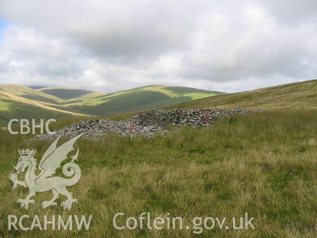 Digital colour photograph of Allt-Lwyd round cairn taken on 02/08/2007 by K. Laws during the Llanegryn Upland Survey undertaken by Engineering Archaeological Services Ltd.
