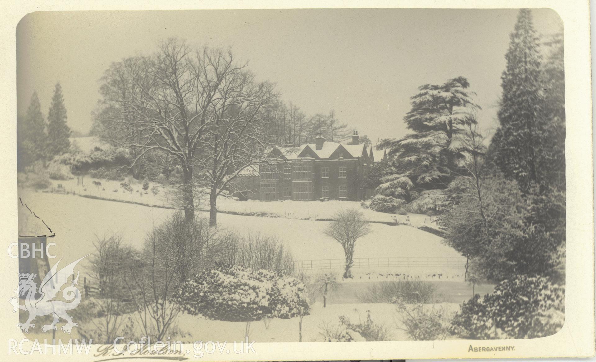 Digitised postcard image of Llanfihangel Court, Crucorney, in snow, R.J. Houlson, Abergavenny. Produced by Parks and Gardens Data Services, from an original item in the Peter Davis Collection at Parks and Gardens UK. We hold only web-resolution images of this collection, suitable for viewing on screen and for research purposes only. We do not hold the original images, or publication quality scans.