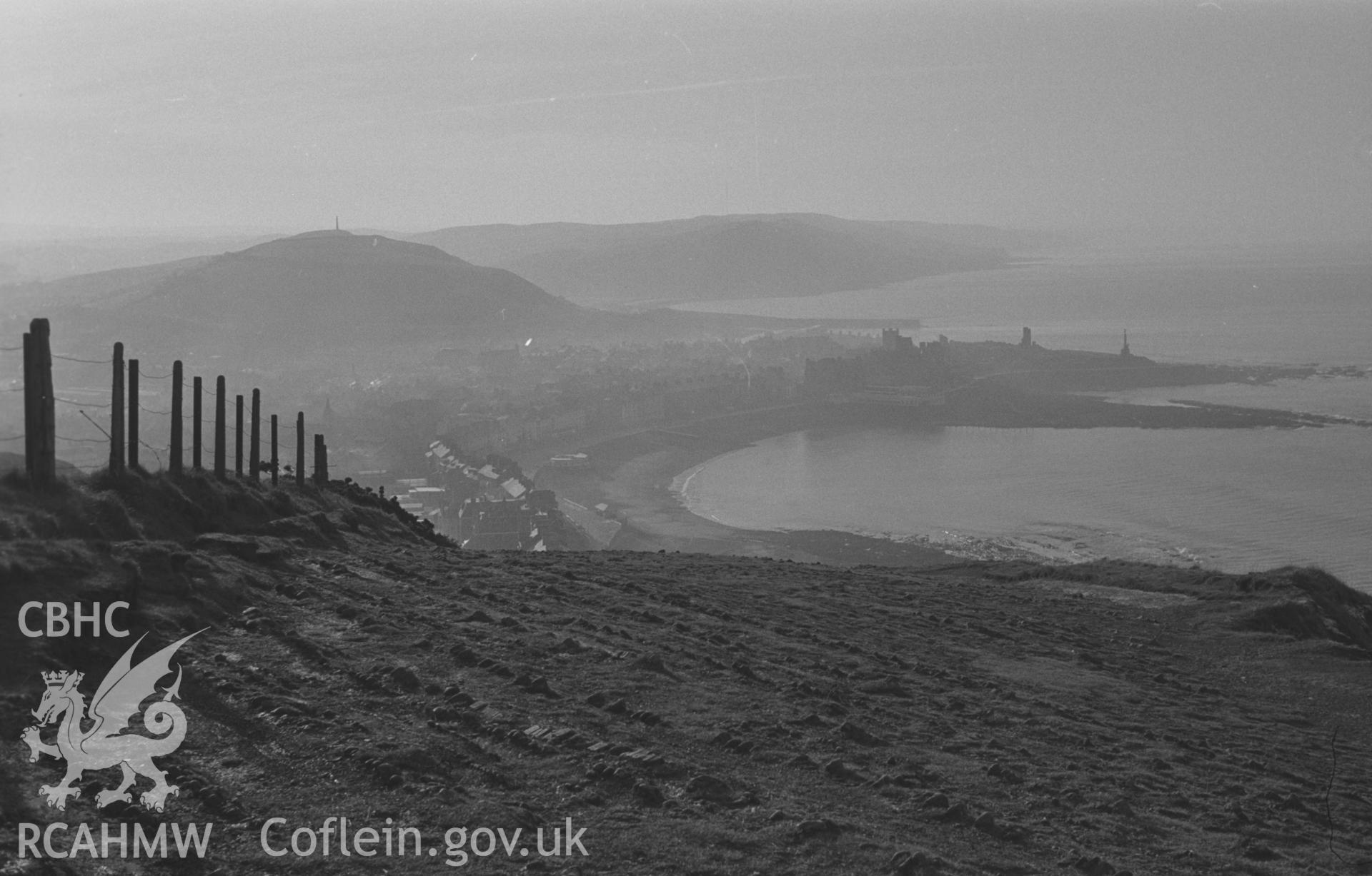 Black and White photograph showing view of Aberystwyth from the top of Constitution Hill. Photographed by Arthur Chater in December 1962, from Grid Reference SN 584 828, looking south.
