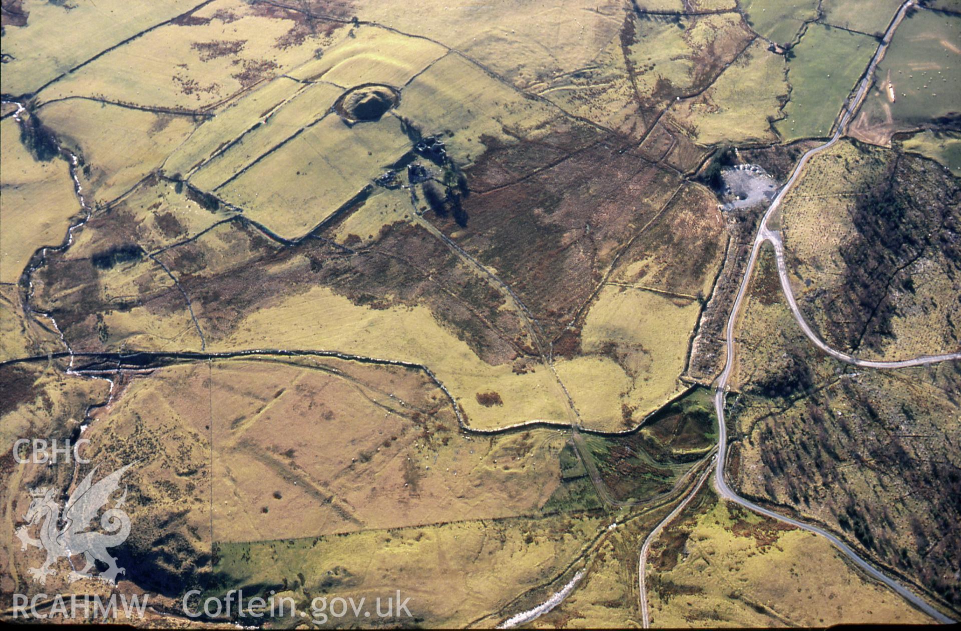 RCAHMW colour slide oblique aerial photograph of Tomen y Mur, taken by C.R.Musson, 1996