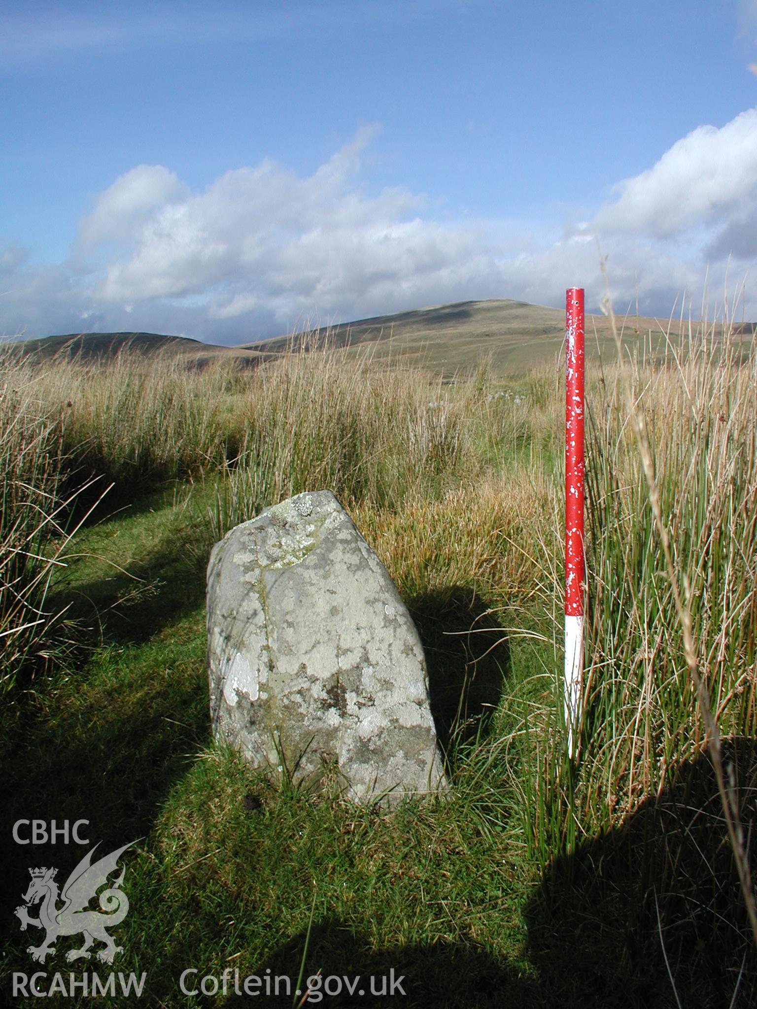 Photograph of Garn Lwyd Standing Stone taken on 18/10/2004 by R.S. Jones during an Upland Survey undertaken by Cambrian Archaeological Projects.
