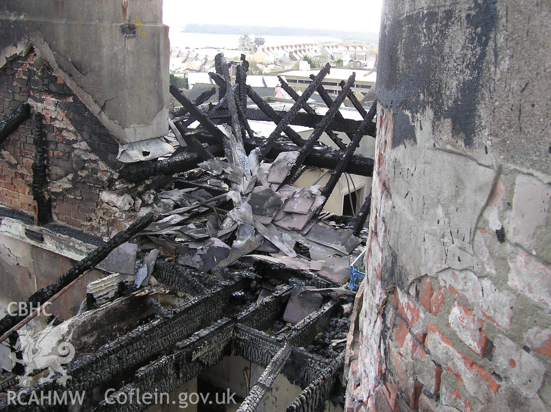 Colour digital photograph showing part of the wreckage of the Royal Gatehouse Hotel.