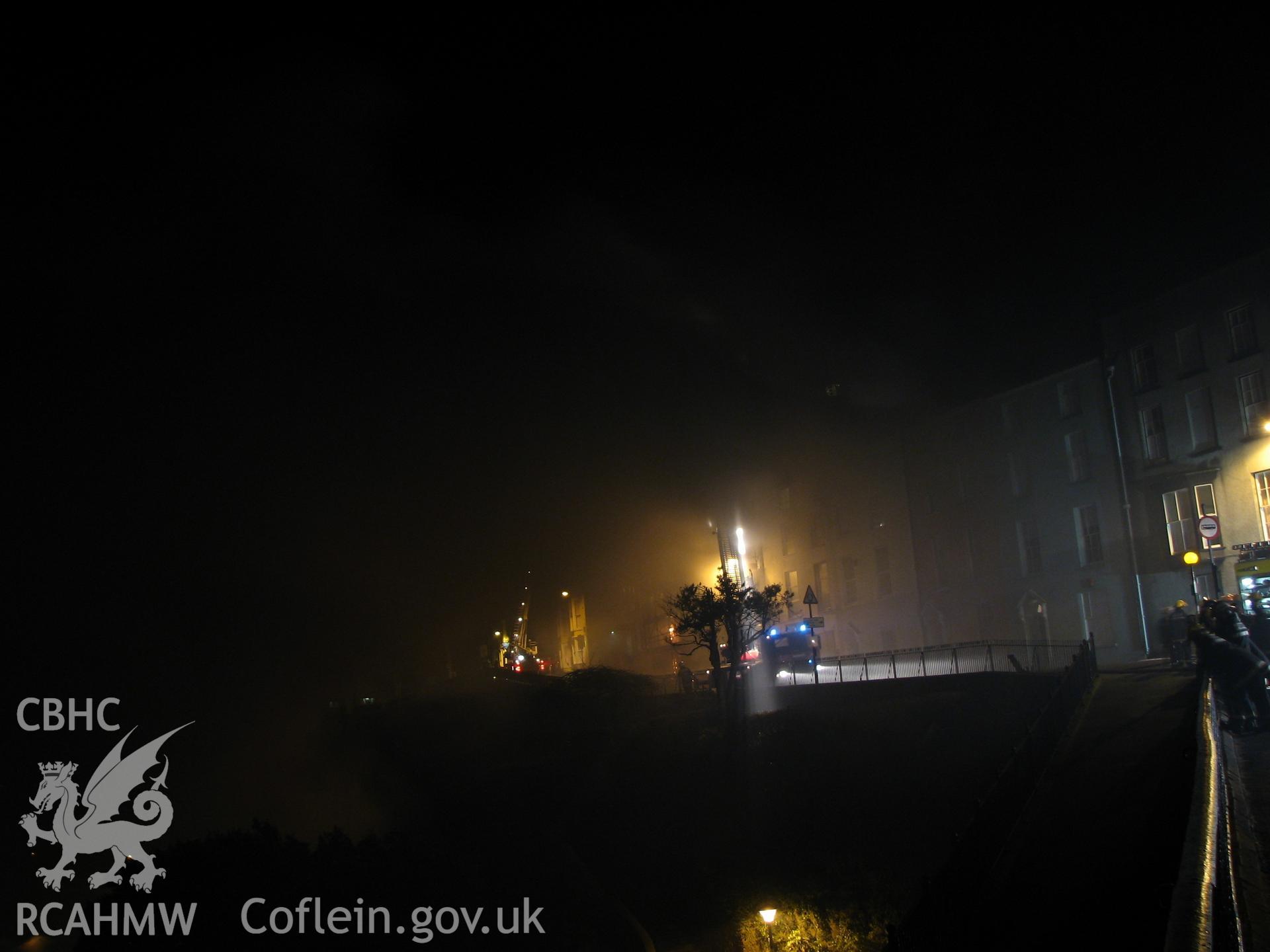Colour digital photograph of The Royal Gatehouse Hotel, on fire.