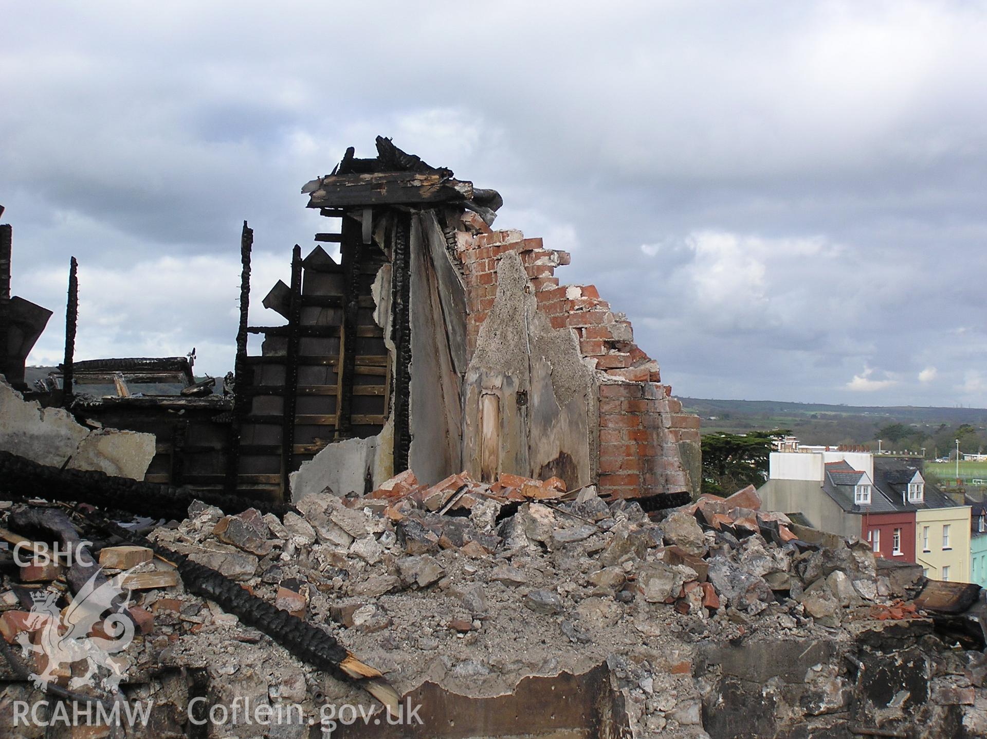 Colour digital photograph showing the wreckage of the Royal Gatehouse Hotel.