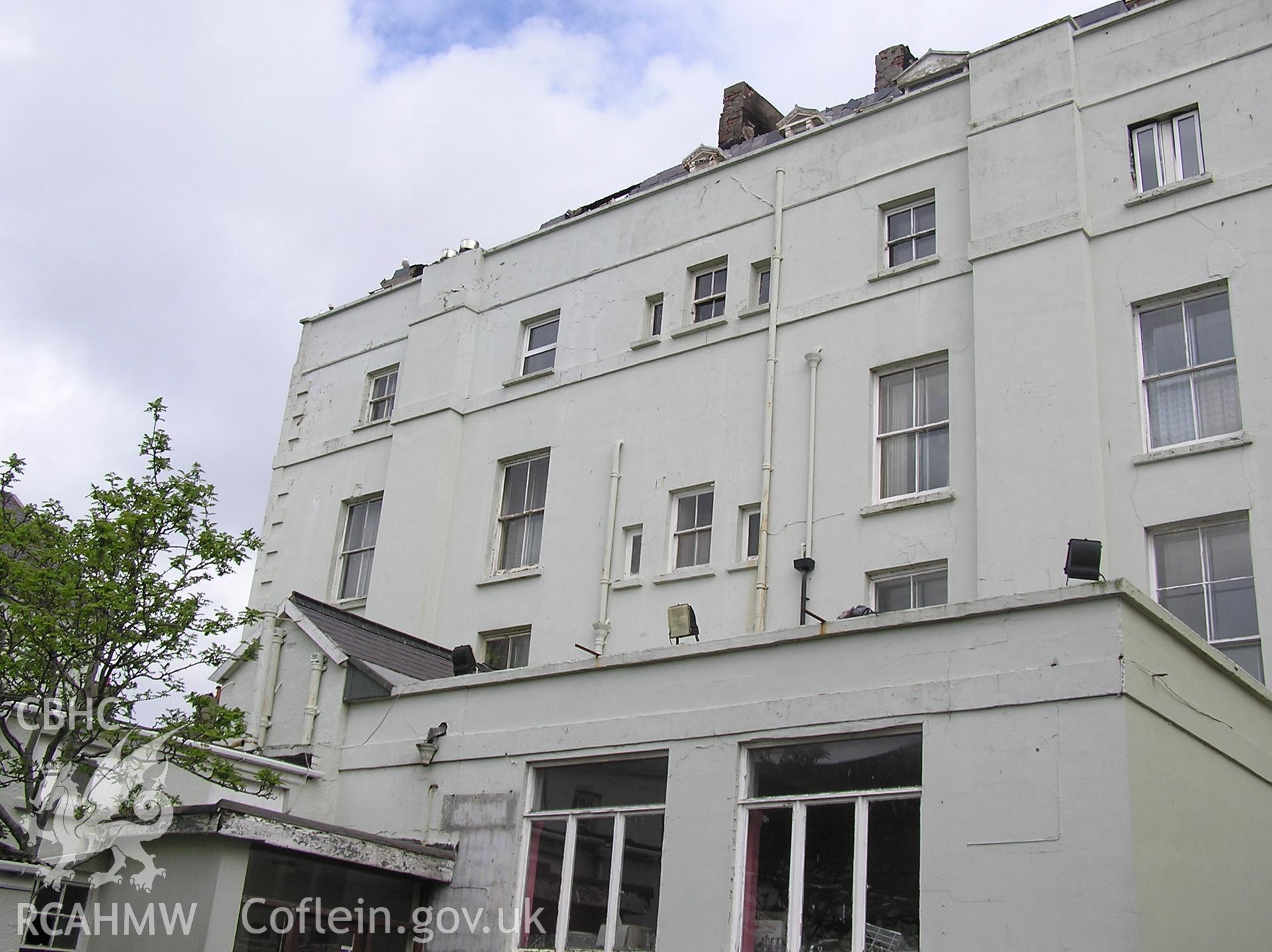 Colour digital photograph showing the damaged rear of the Royal Gatehouse Hotel.