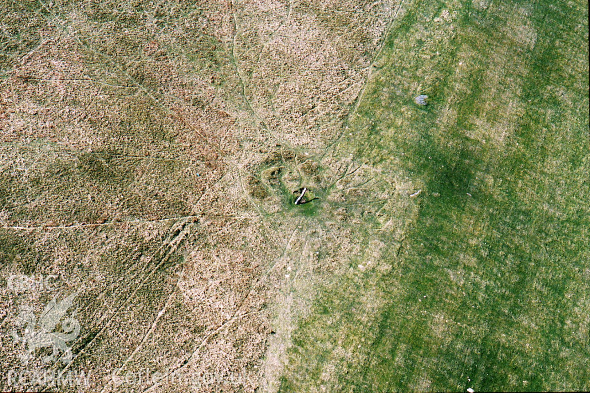 RCAHMW colour slide oblique aerial photograph of Cefn Gelli-gaer Inscribed Stone, Bedlinog, taken by C.R. Musson, 18/04/94