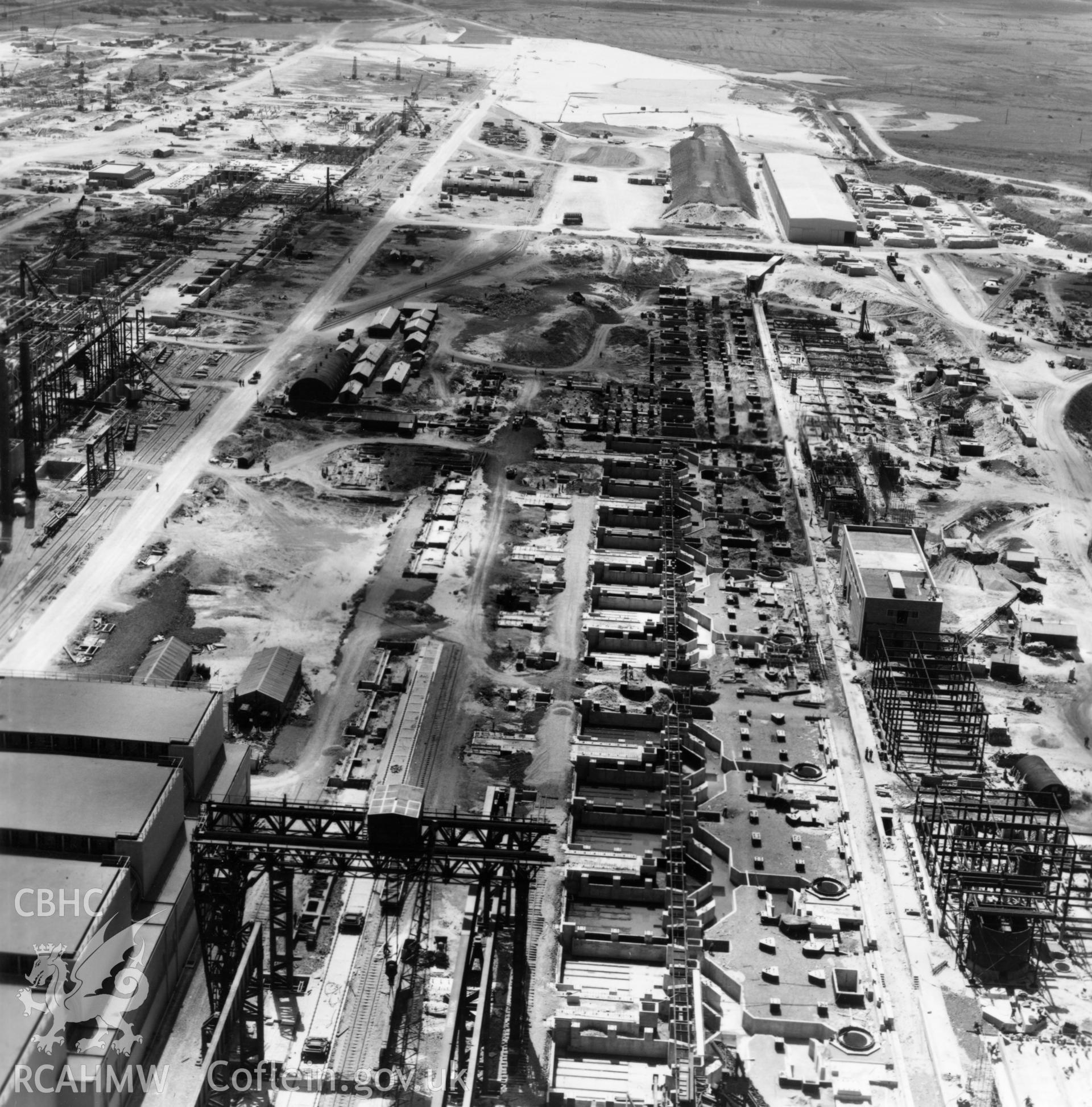 View of Abbey Steelworks, Port Talbot, under construction. Oblique aerial photograph, 5?" cut roll film.