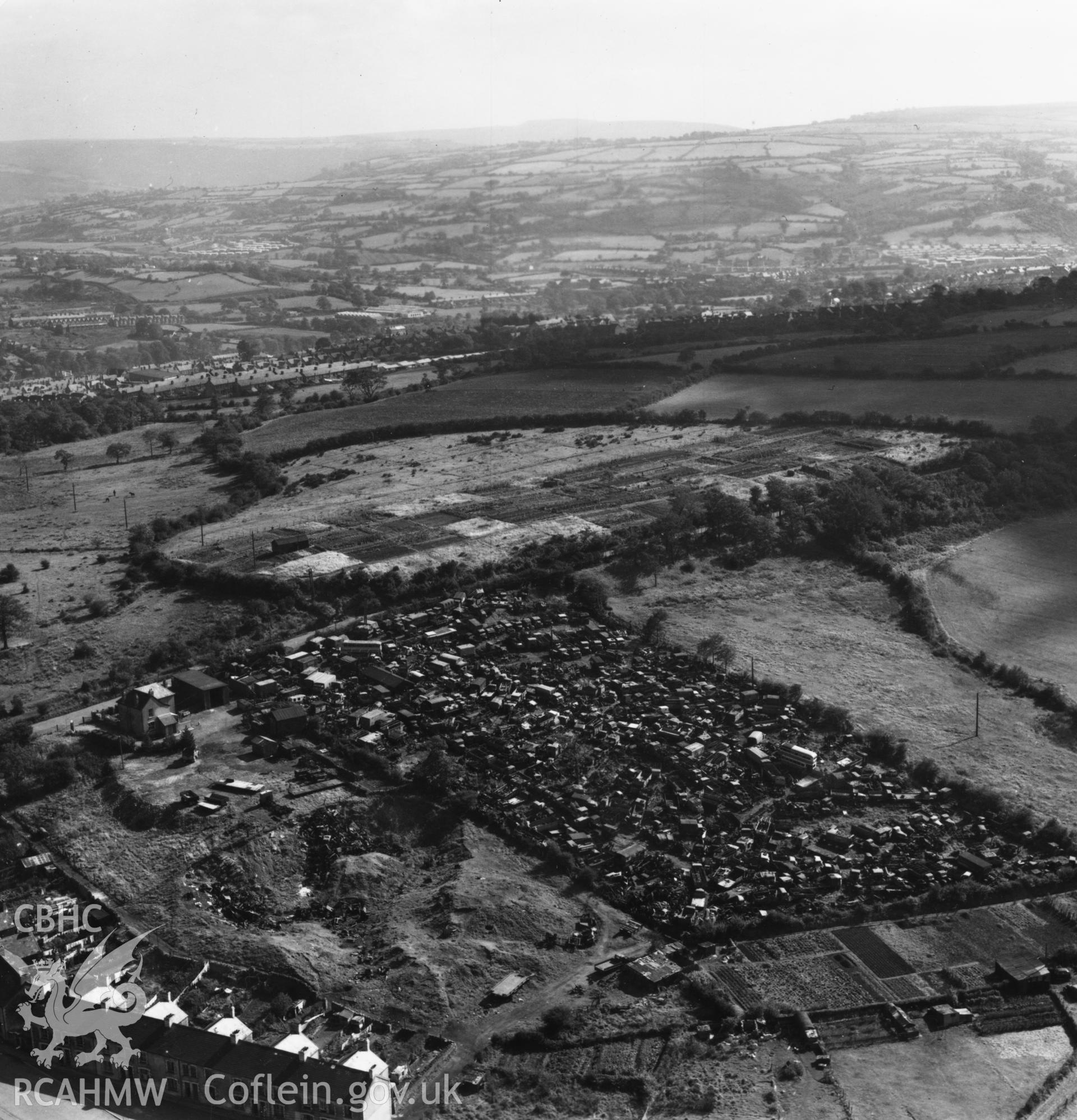 View of Gibbs Brothers vehicle scrap yard at Blackwood, Mynyddislwyn. Oblique aerial photograph, 5?" cut roll film.