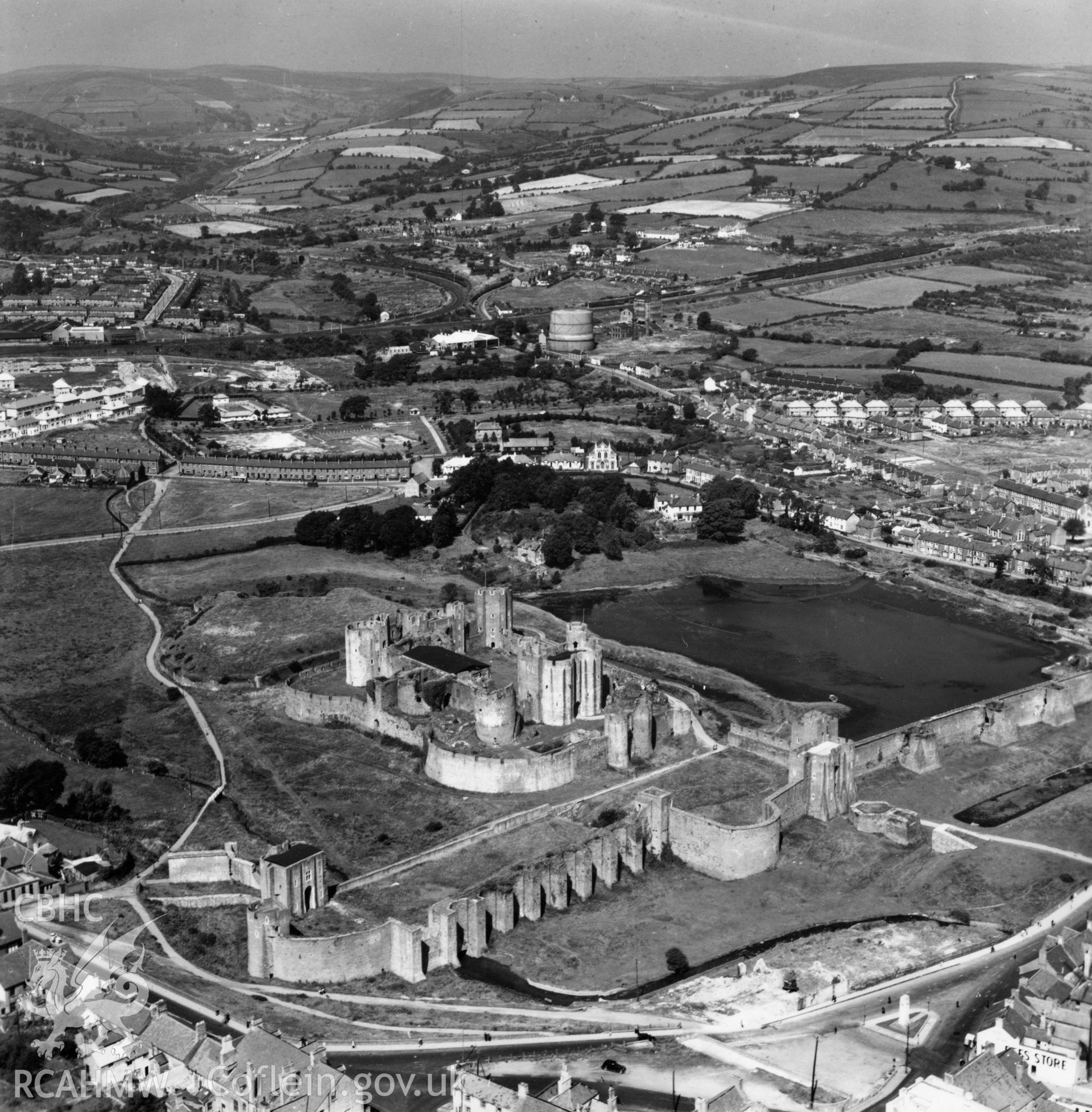 View of Caerphilly showing castle and housing estates. Oblique aerial photograph, 5?" cut roll film.