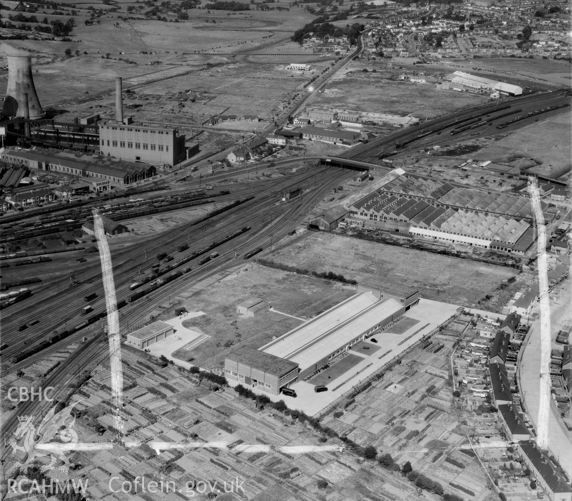 View of F.E. Fox biscuit factory, Cardiff, showing power station in background