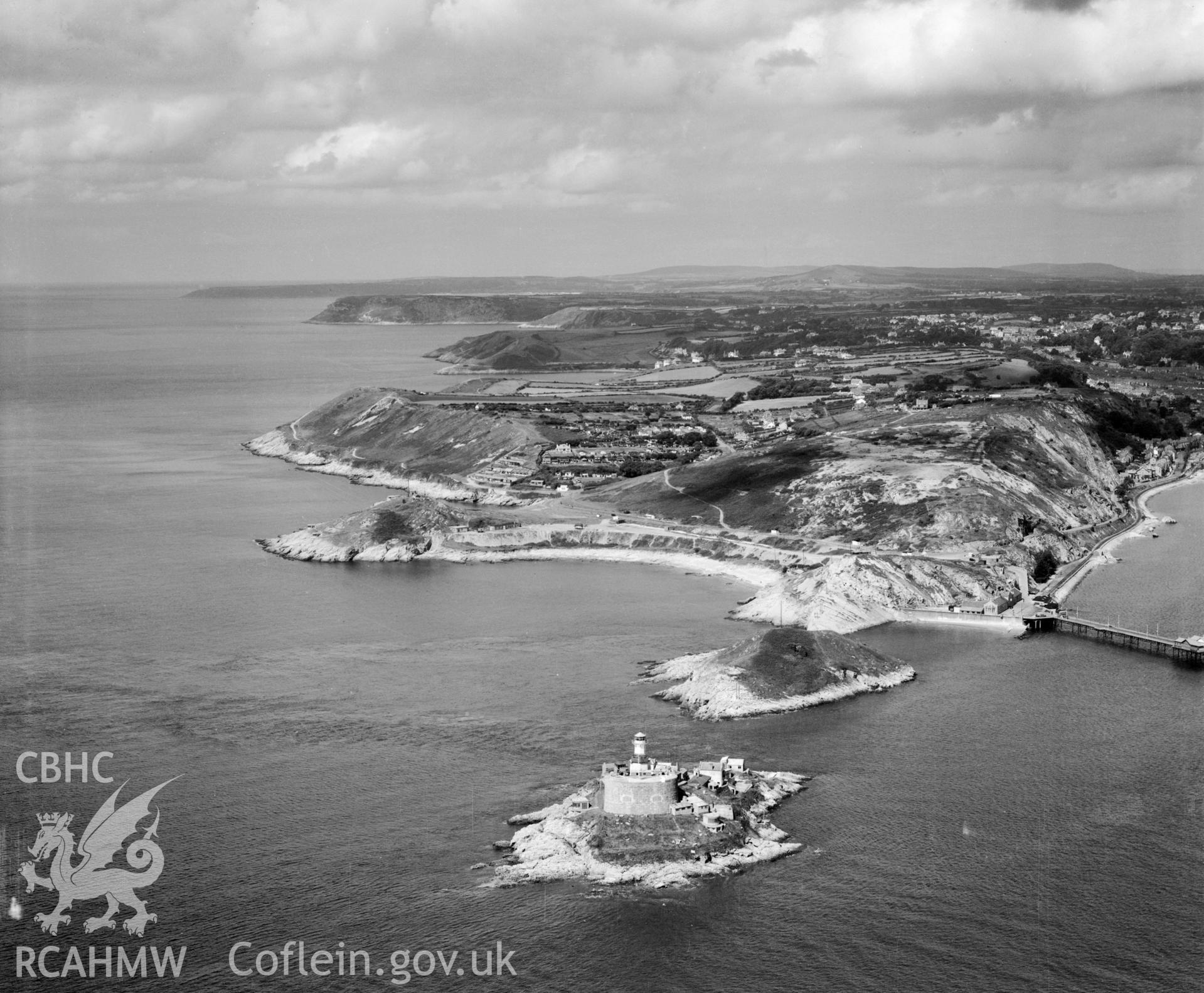 View of Mumbles Head showing pier, lighthouse and fort. Oblique aerial photograph, 5?" cut roll film.