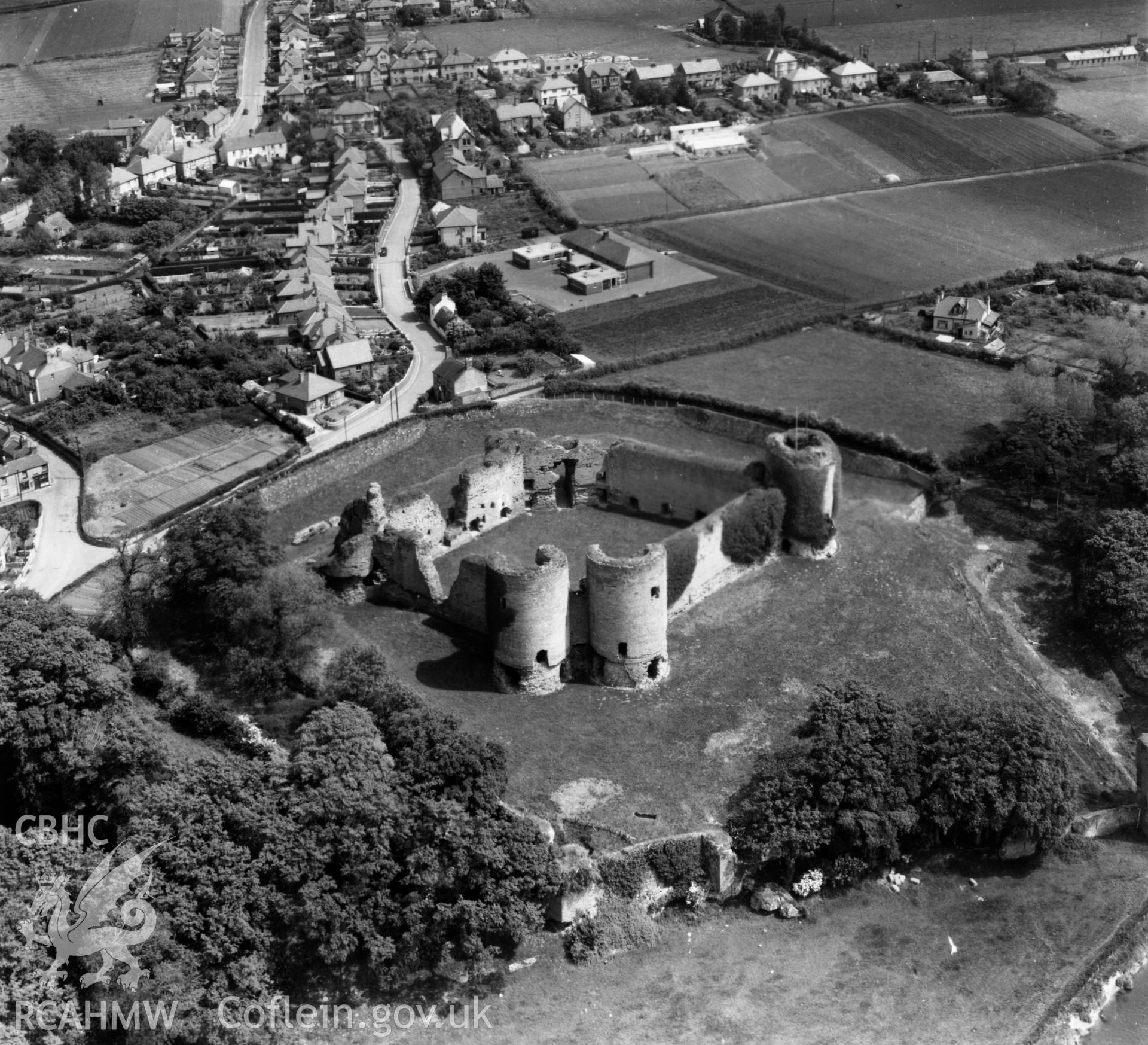 View of Rhuddlan showing castle. Oblique aerial photograph, 5?" cut roll film.