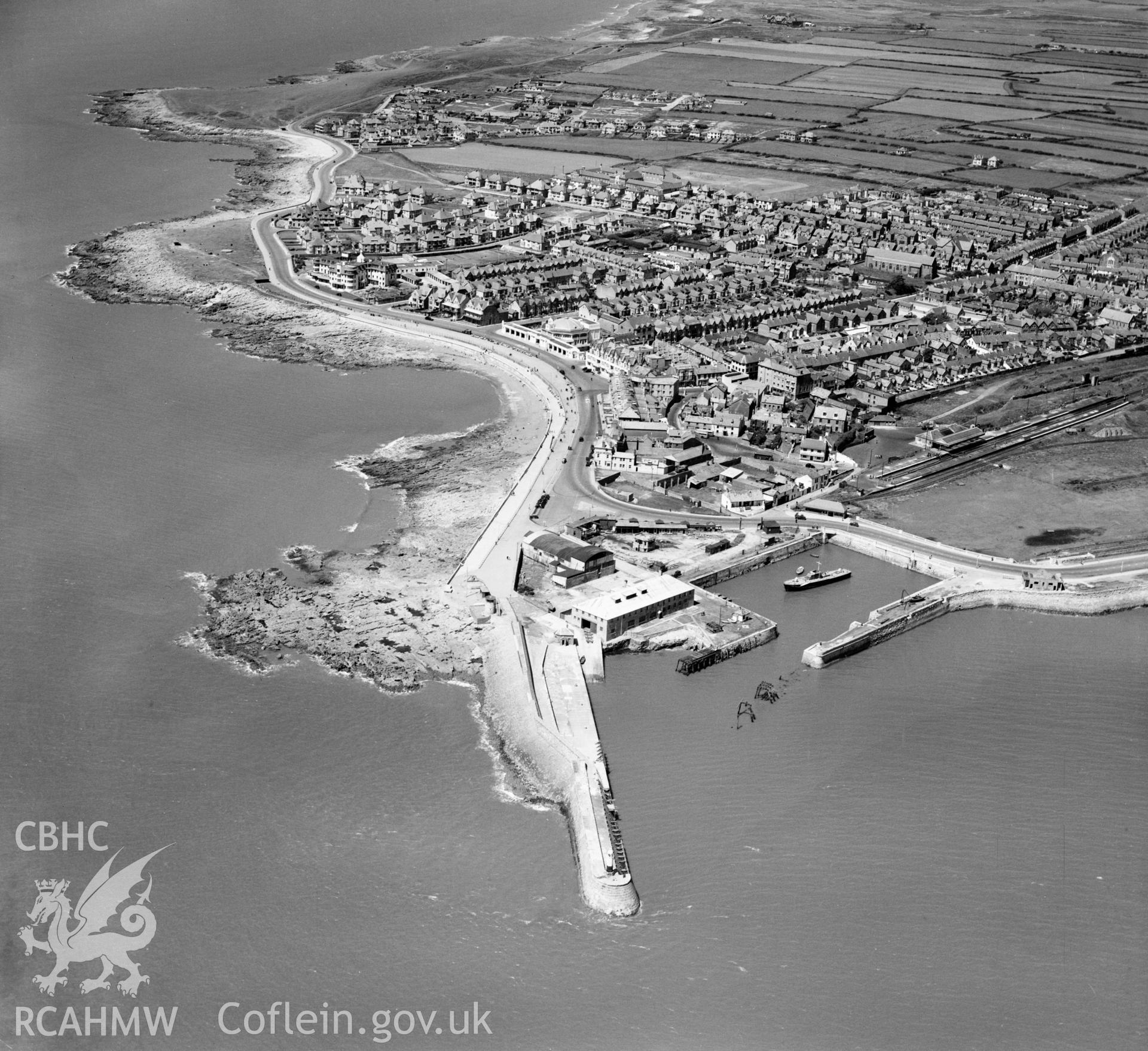 View of Porthcawl showing town, including harbour, Grand Pavilion, Esplanade, railway and cinema. Oblique aerial photograph, 5?" cut roll film.