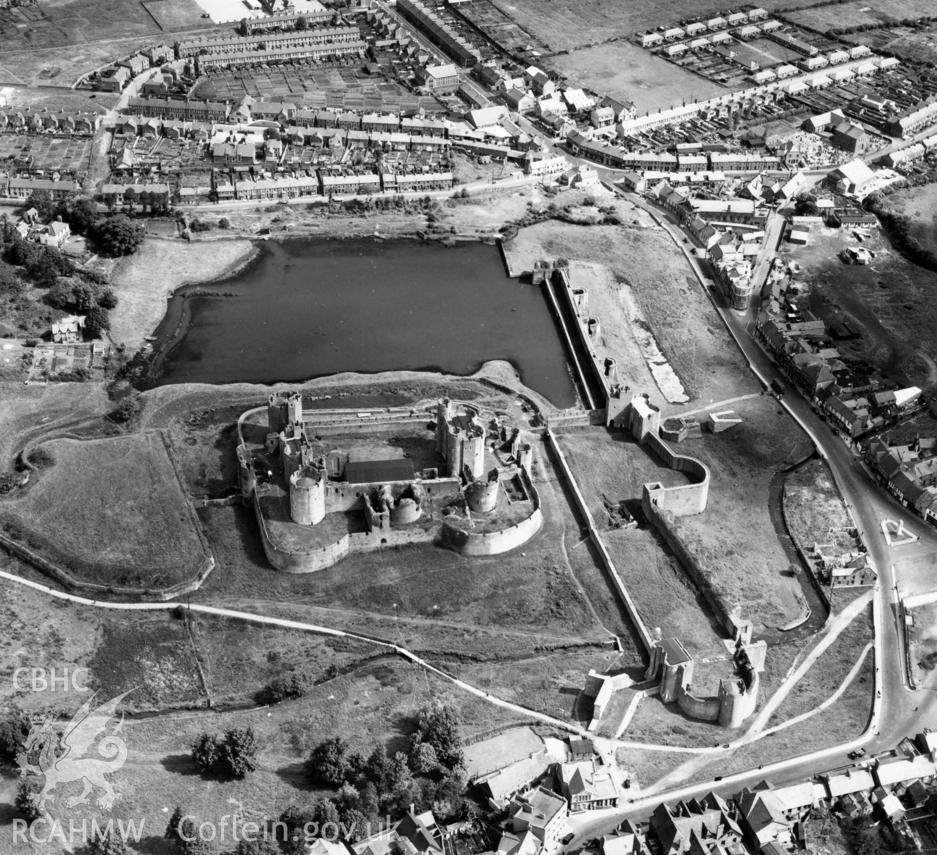View of Caerphilly showing castle. Oblique aerial photograph, 5?" cut roll film.