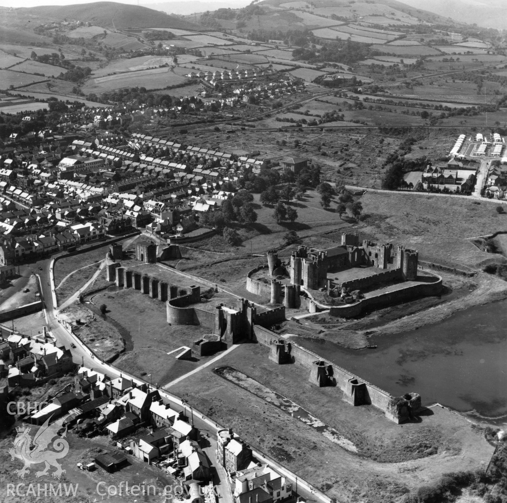 View of Caerphilly showing castle and housing estates. Oblique aerial photograph, 5?" cut roll film.