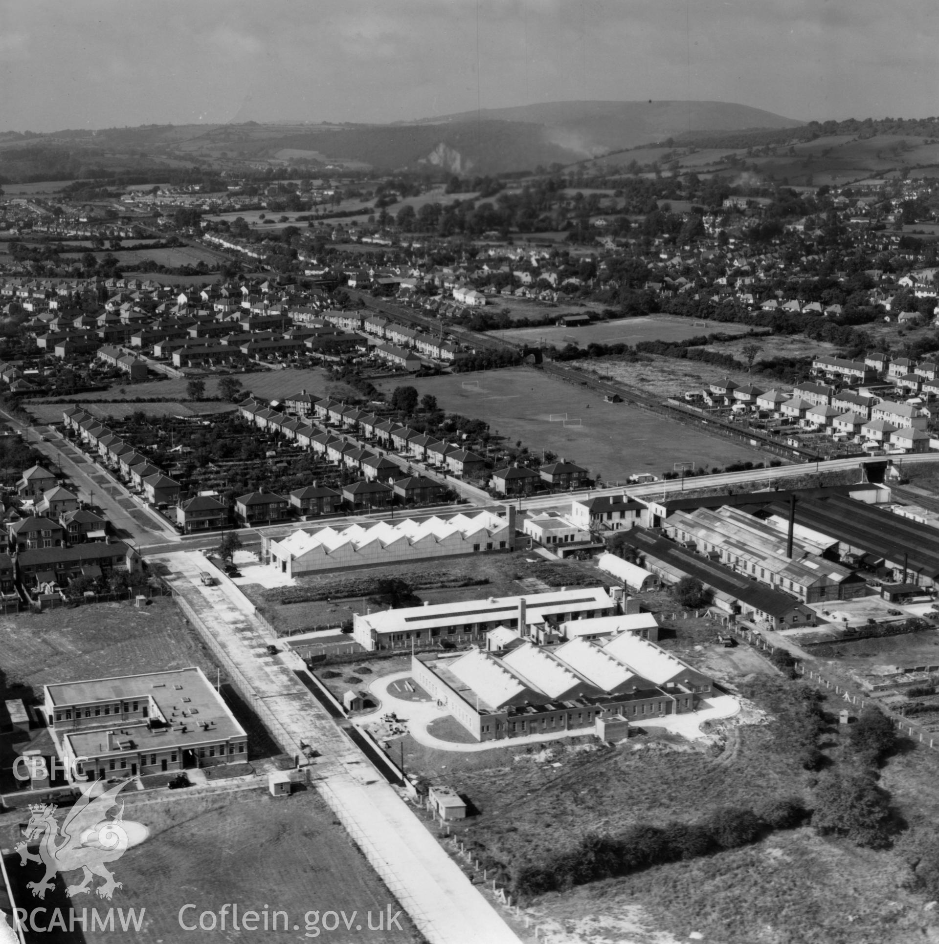 General view of factories and government buildings including the RO factory and new Inland Revenue buildings at Llanishen. Oblique aerial photograph, 5?" cut roll film.