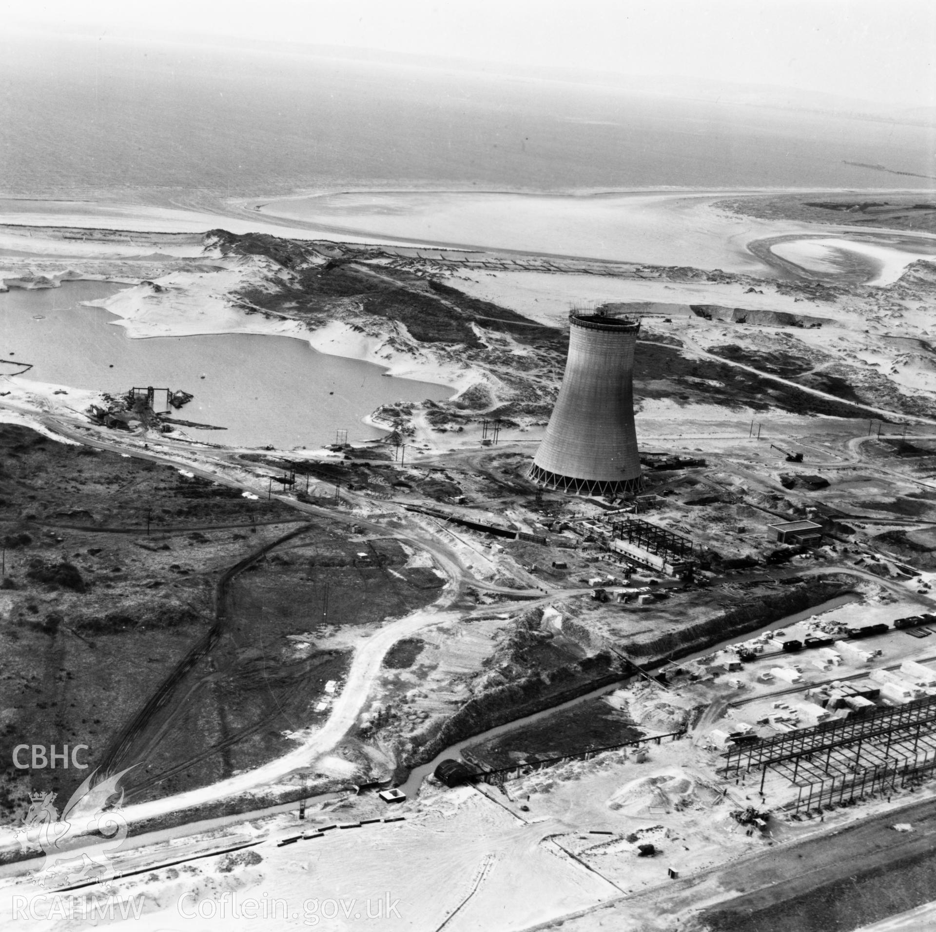 View of Abbey Steelworks, Port Talbot, under construction, showing cooling tower. Oblique aerial photograph, 5?" cut roll film.