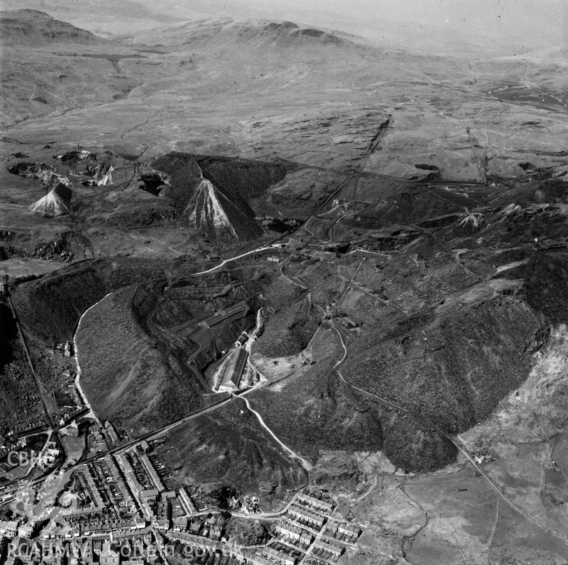 View of Fotty & Bowydd slate quarry showing Blaenau Ffestiniog in the foreground, commissioned by Oakley Slate quarries Co. Ltd.. Oblique aerial photograph, 5?" cut roll film.