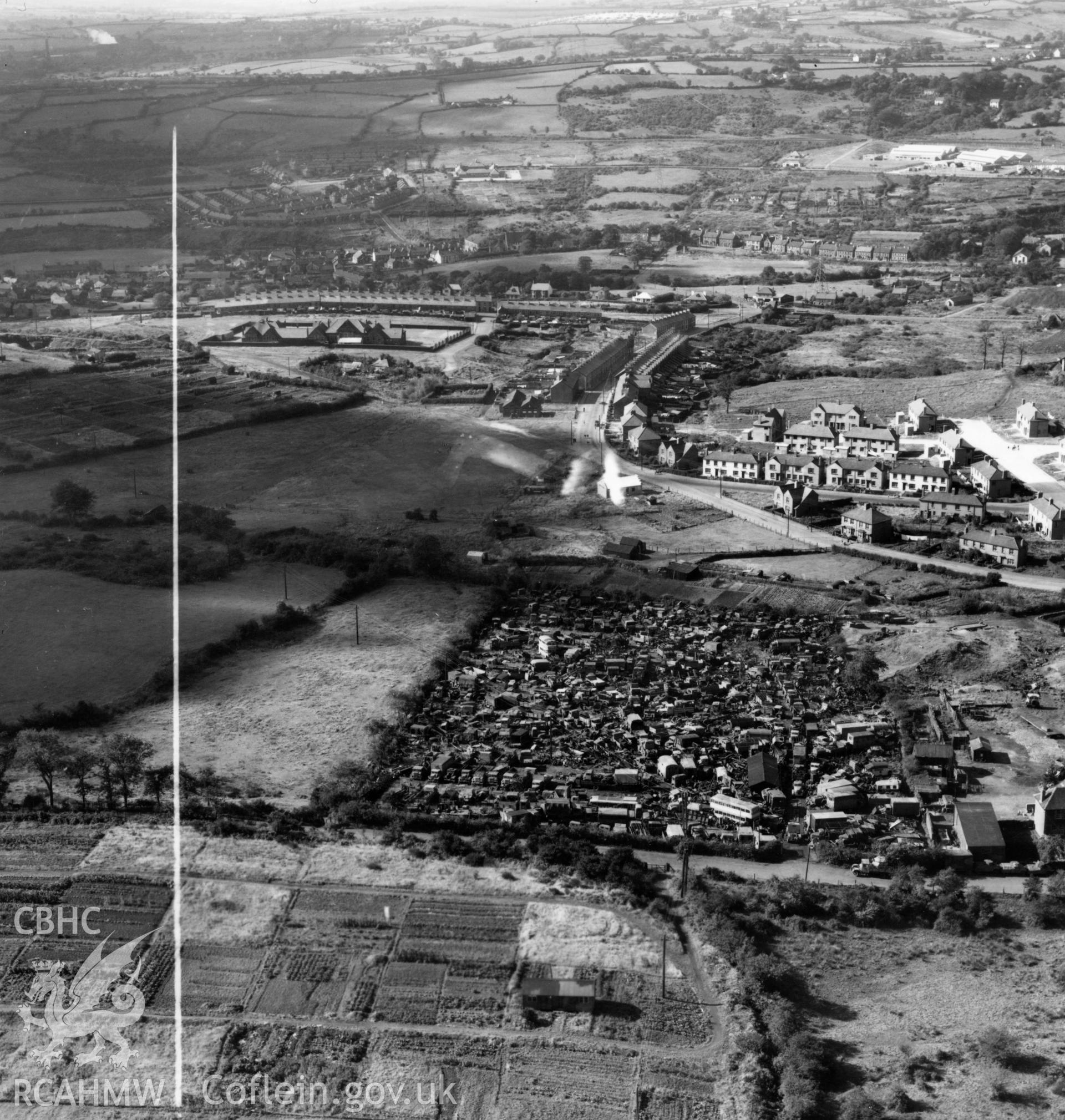 View of Gibbs Brothers vehicle scrap yard at Blackwood, Mynyddislwyn. Oblique aerial photograph, 5?" cut roll film.