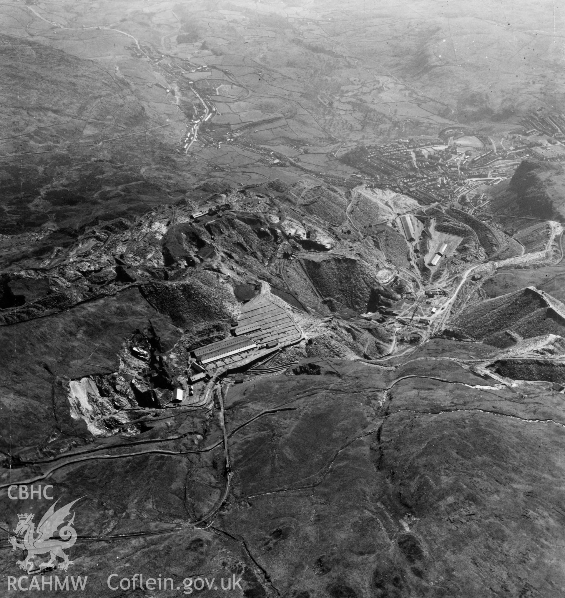 General view of Maenofferen and Fotty Bowydd slate quarries with Blaenau Ffestiniog in the foreground, commissioned by Oakley Slate quarries Co. Ltd.. Oblique aerial photograph, 5?" cut roll film.