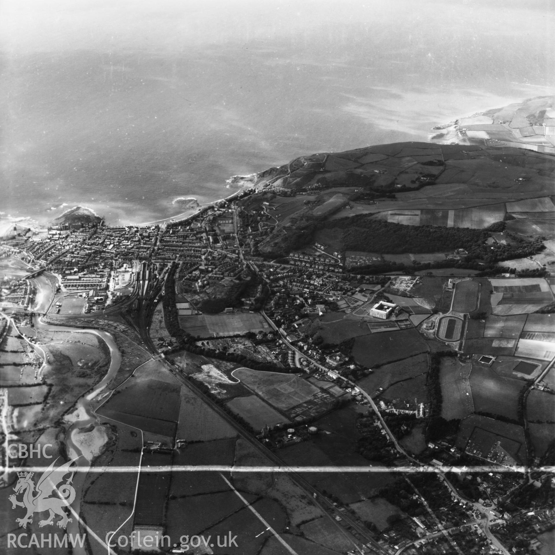Distant view of Aberystwyth, commissioned by J.E. Nichols. Oblique aerial photograph, 5?" cut roll film.