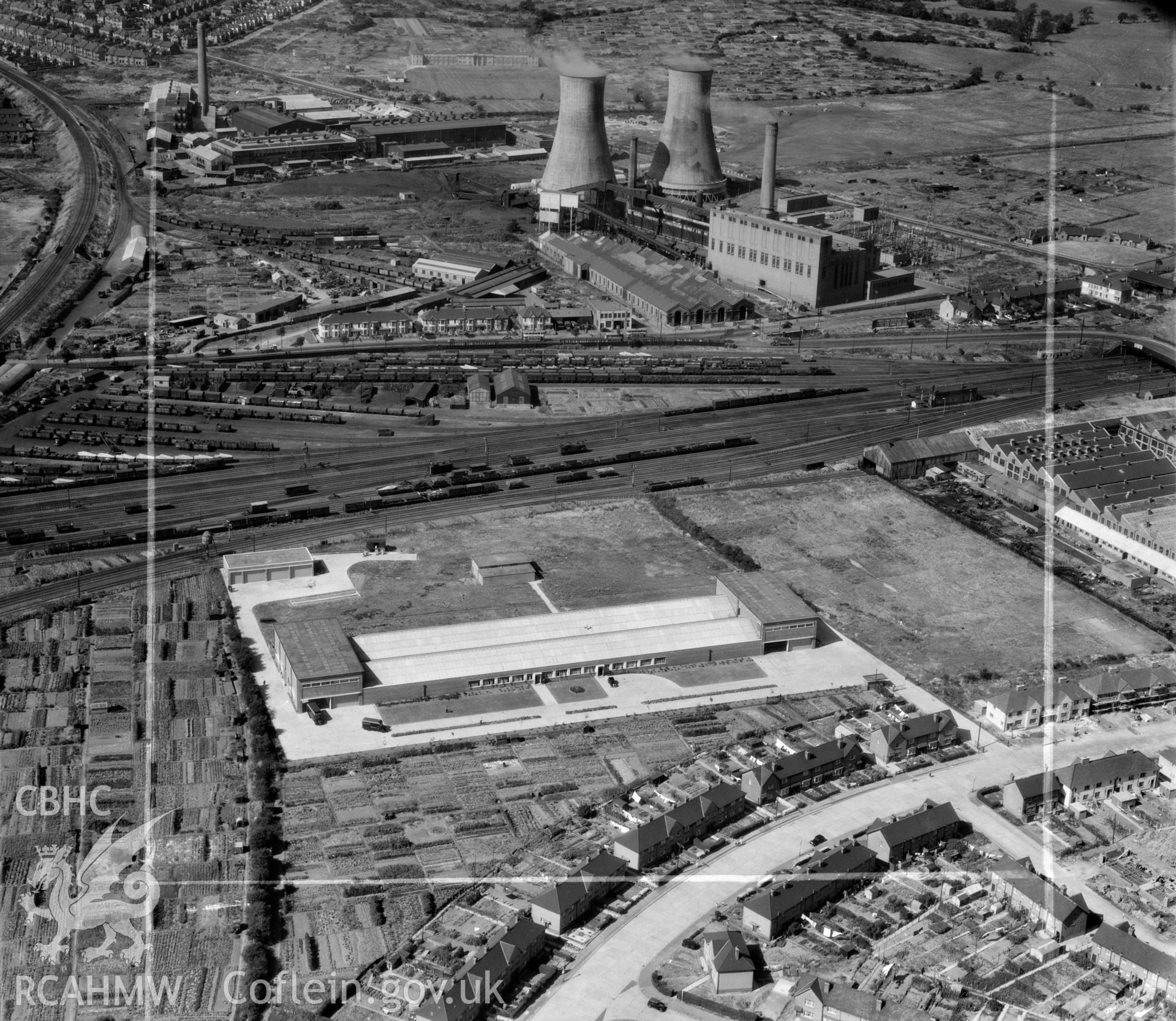 View of F.E. Fox biscuit factory, Cardiff, showing power station in background