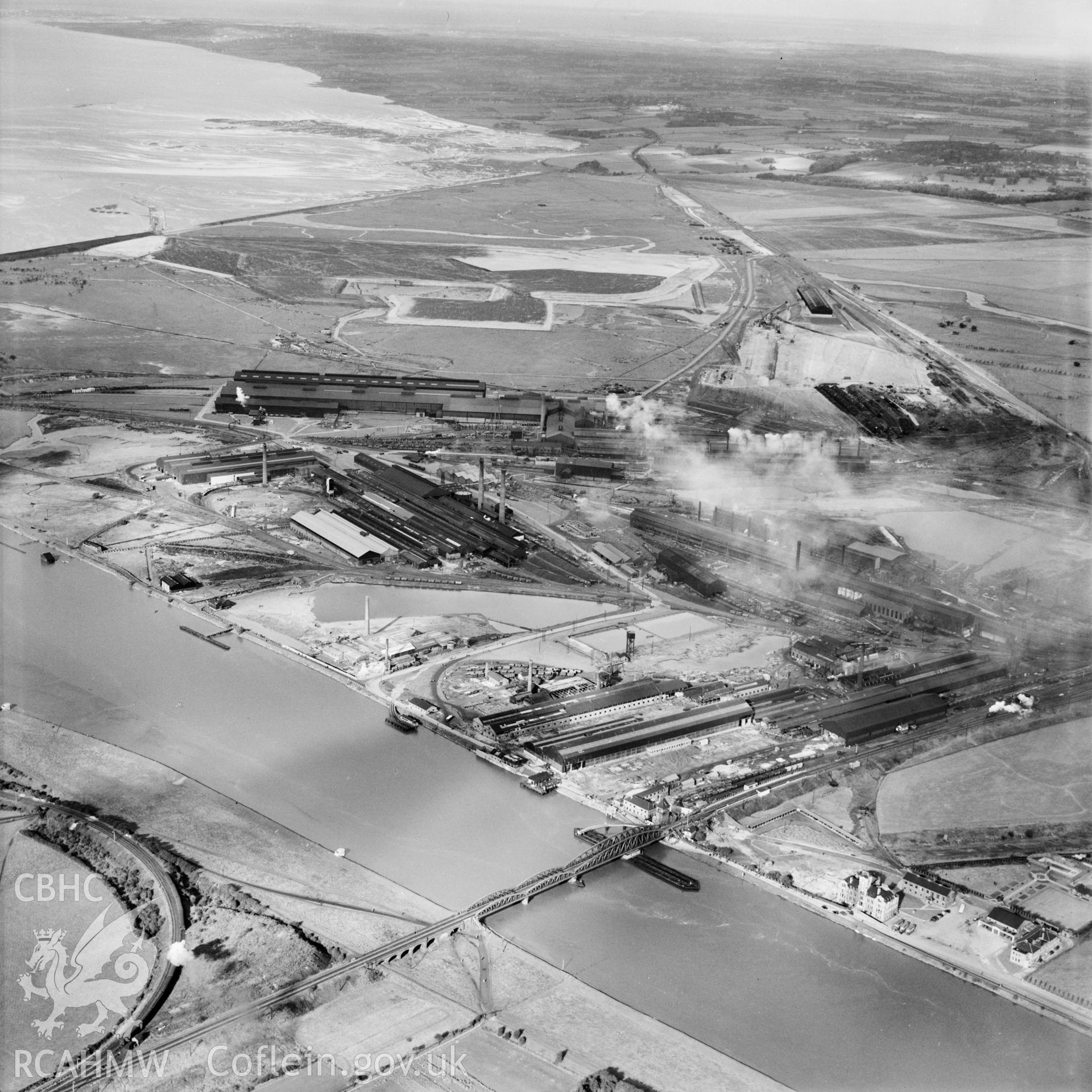 View of the Shotton steelworks site showing Hawarden Bridge (commissioned by Westminster Dredging Co.). Oblique aerial photograph, 5?" cut roll film.
