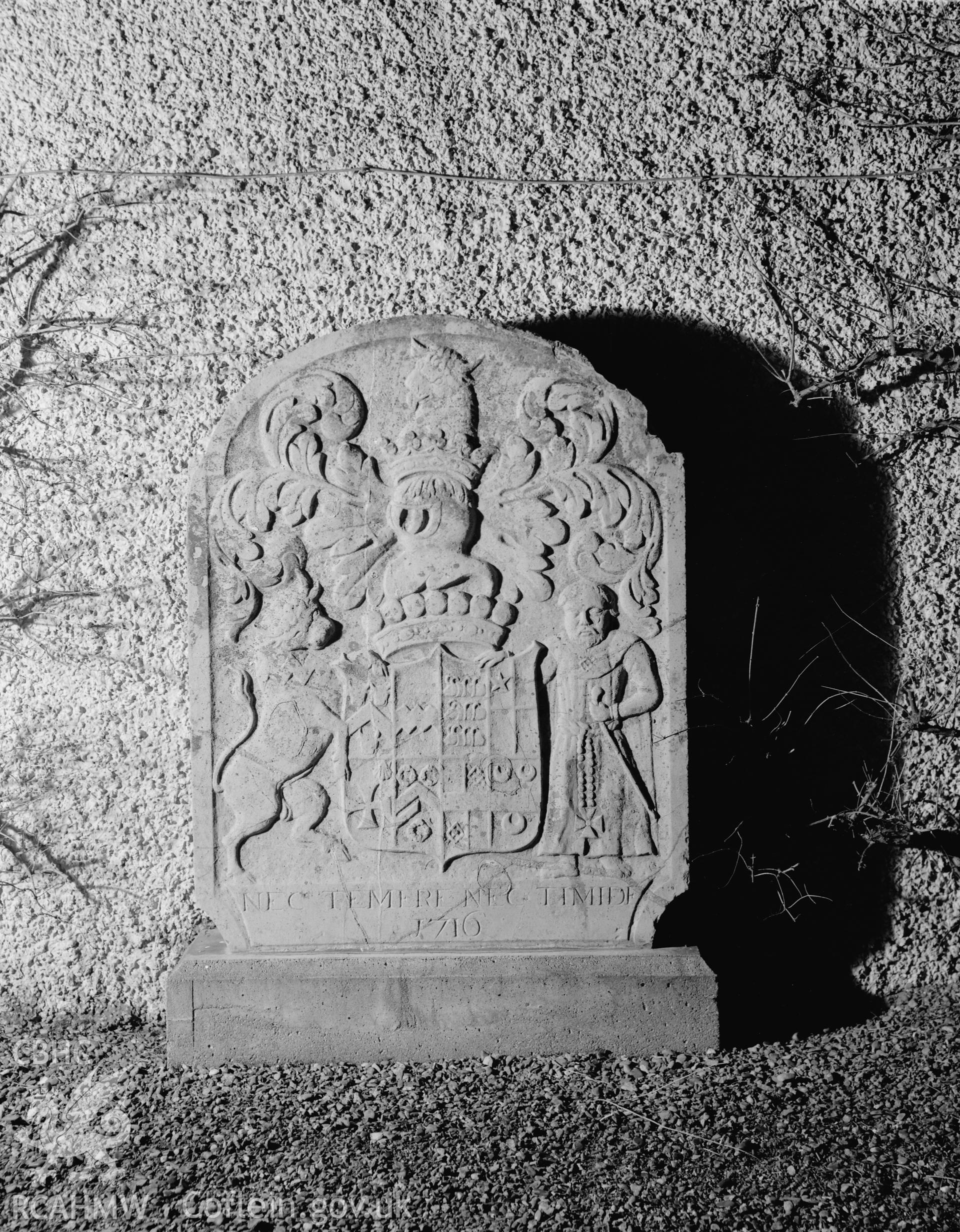 Black and white photo of the armorial stone, Baron Hill, Beaumaris, now at Pen-Y-Parc, Beaumaris.