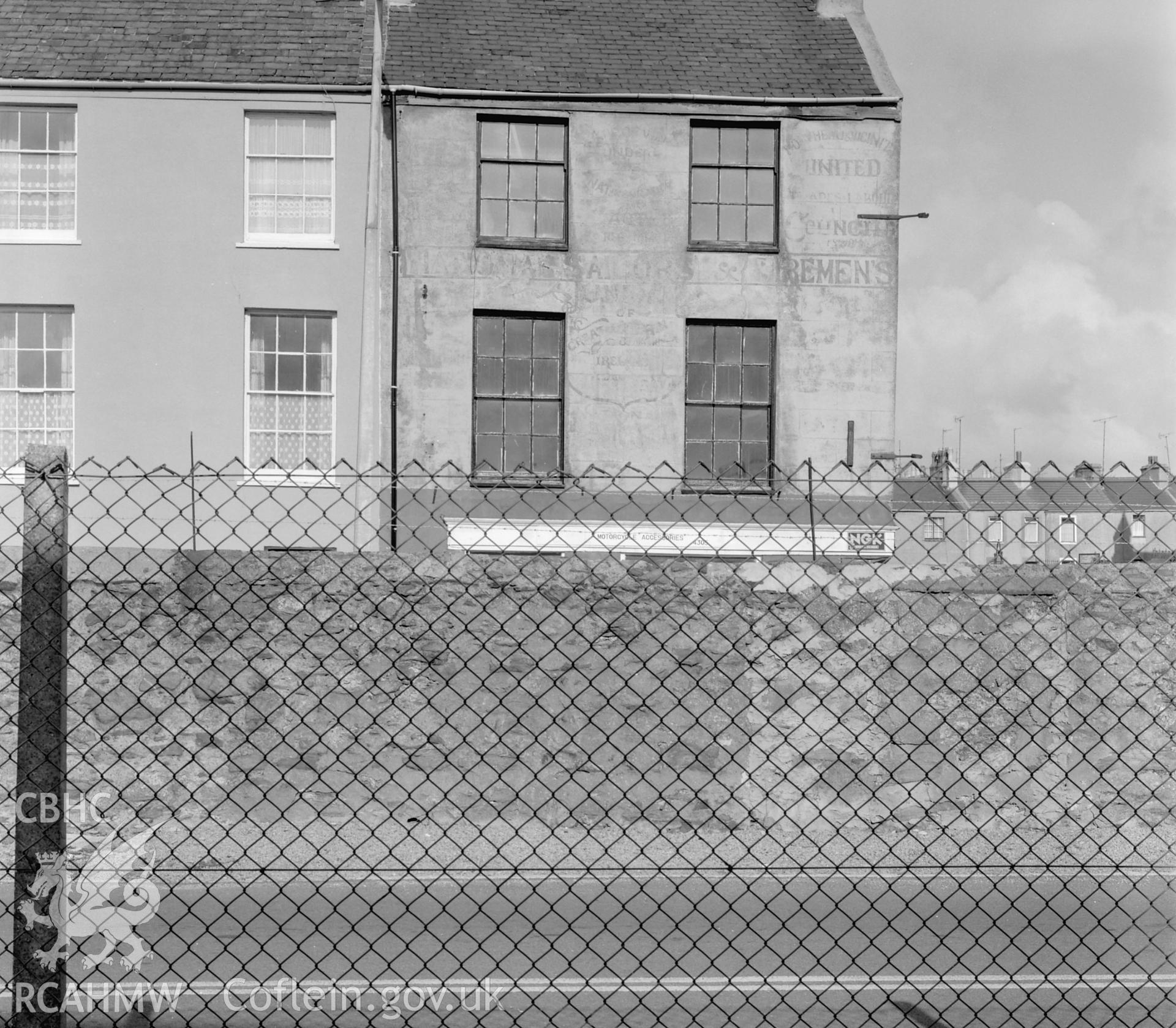 Two black and white photographs of the former Seamen's Union, Holyhead.