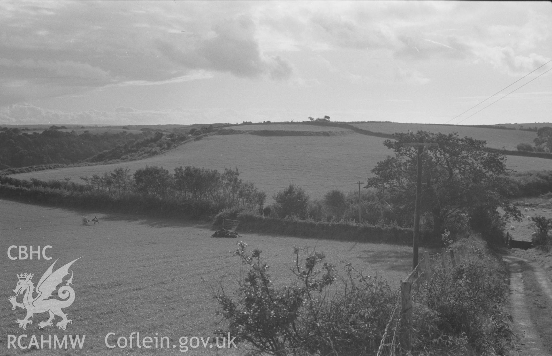Digital copy of a black and white negative showing view of Gilfach Hael camp. Photographed by Arthur O. Chater in September 1964 from Grid Reference SN 5625 7027, looking west south west.