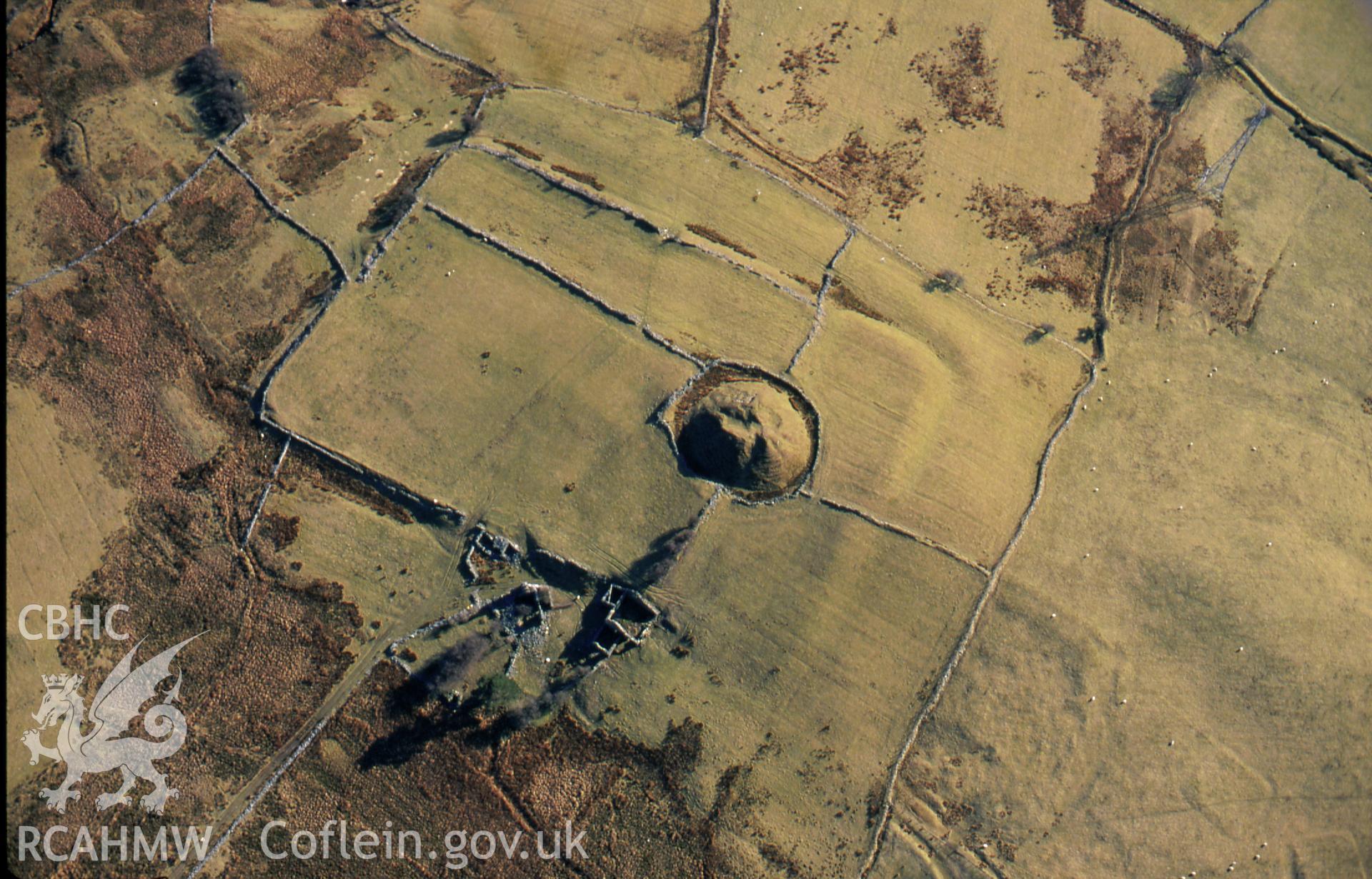RCAHMW colour slide oblique aerial photograph of Tomen-y-mur (castell), Maentwrog, taken by C.R.Musson on the 30/03/1996