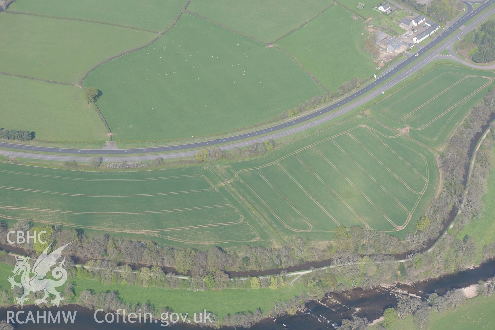Cefn-Brynich Roman Fort and Cefn Brynich Farm. Oblique aerial photograph taken during the Royal Commission's programme of archaeological aerial reconnaissance by Toby Driver on 21st April 2015