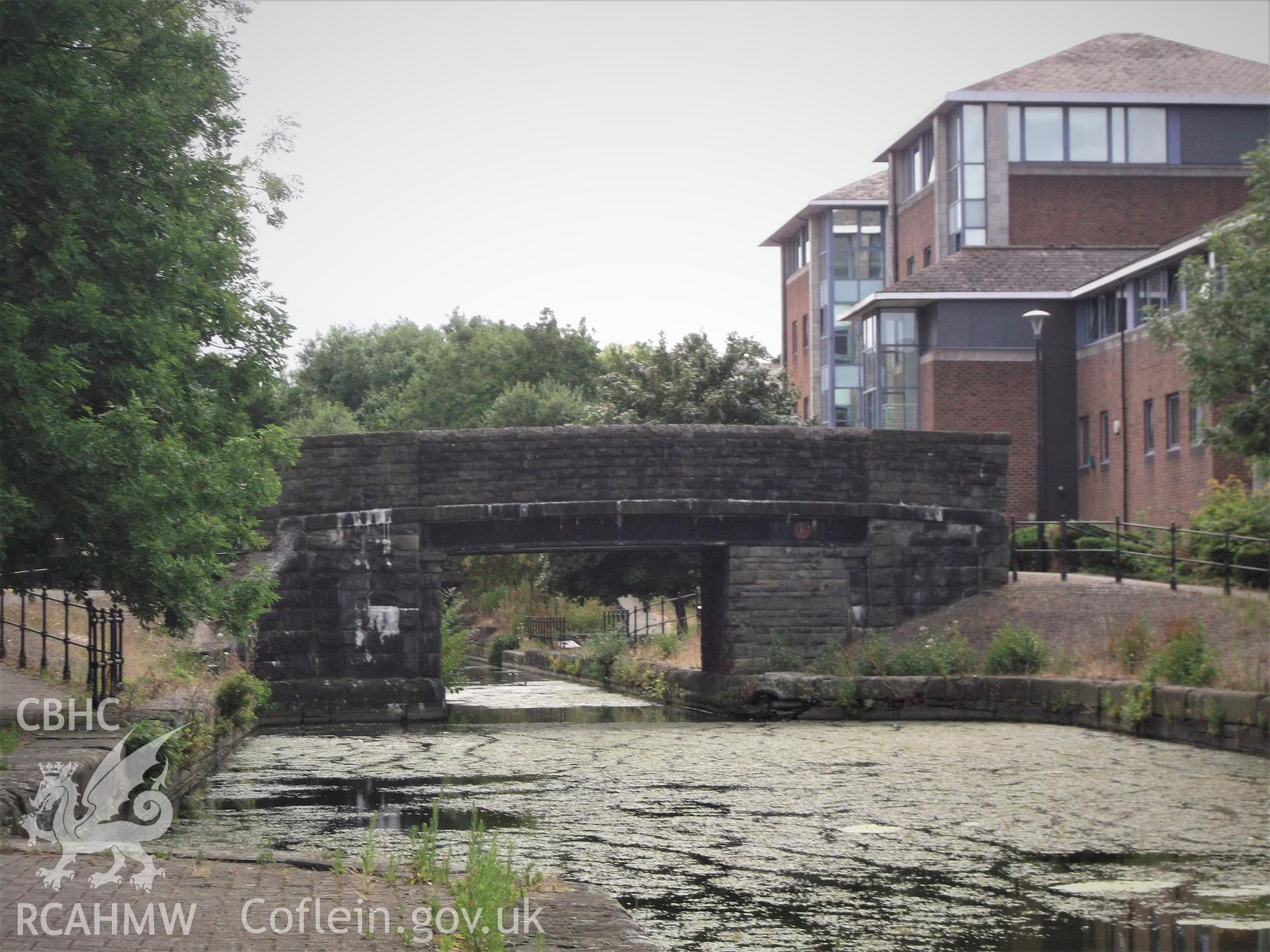 Colour photograph showing exterior of Road Bridge over Junction Canal, Butetown, Cardiff. Photographed during survey conducted by Adam N. Coward on 17th July 2018.