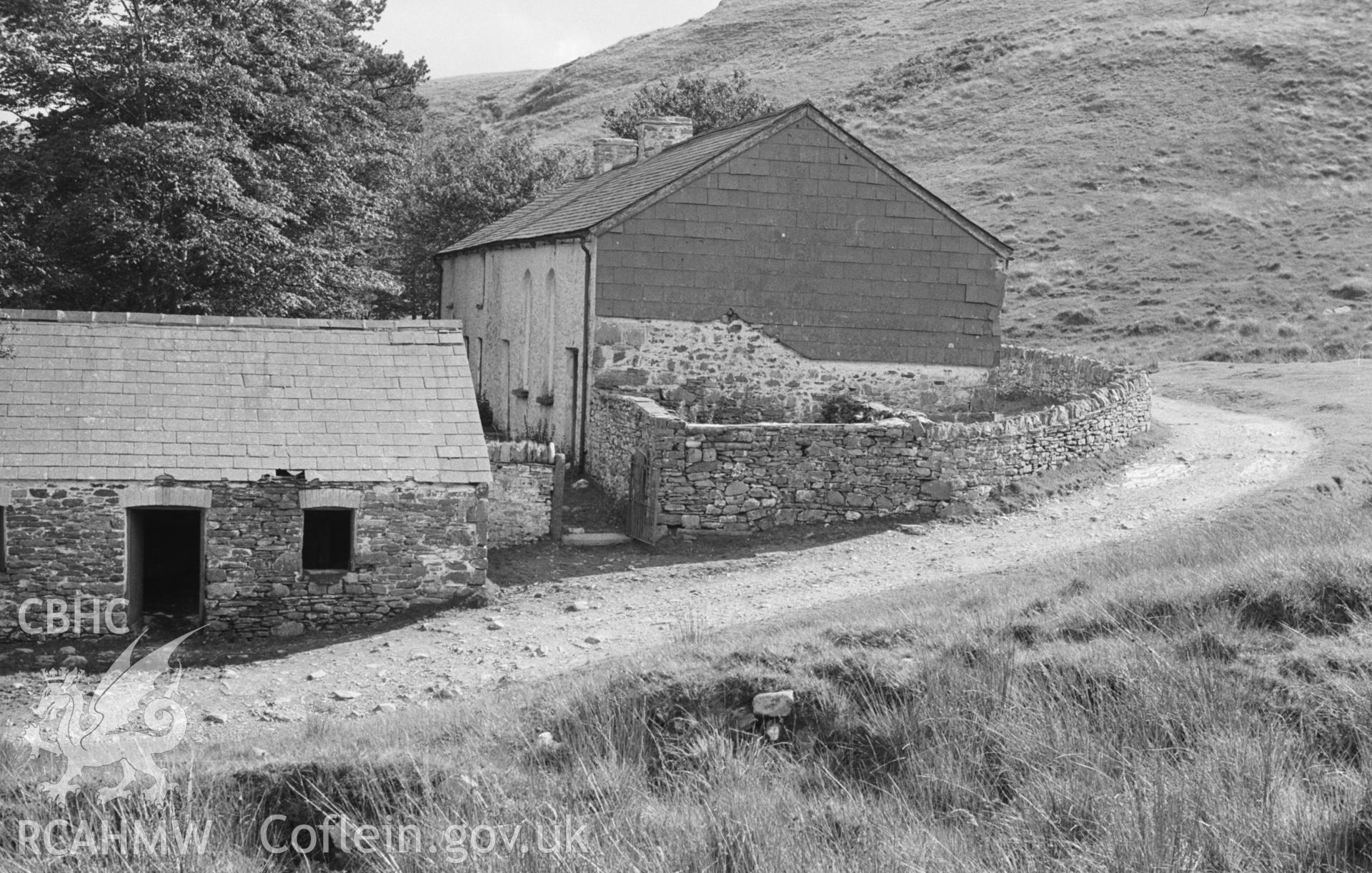 Digital copy of a black and white negative showing exterior side elevation of Soar-y-Mynydd, Llanddewi Brefi. Photographed in September 1963 by Arthur O. Chater from Grid Reference SN 7845 5331, looking south south east.
