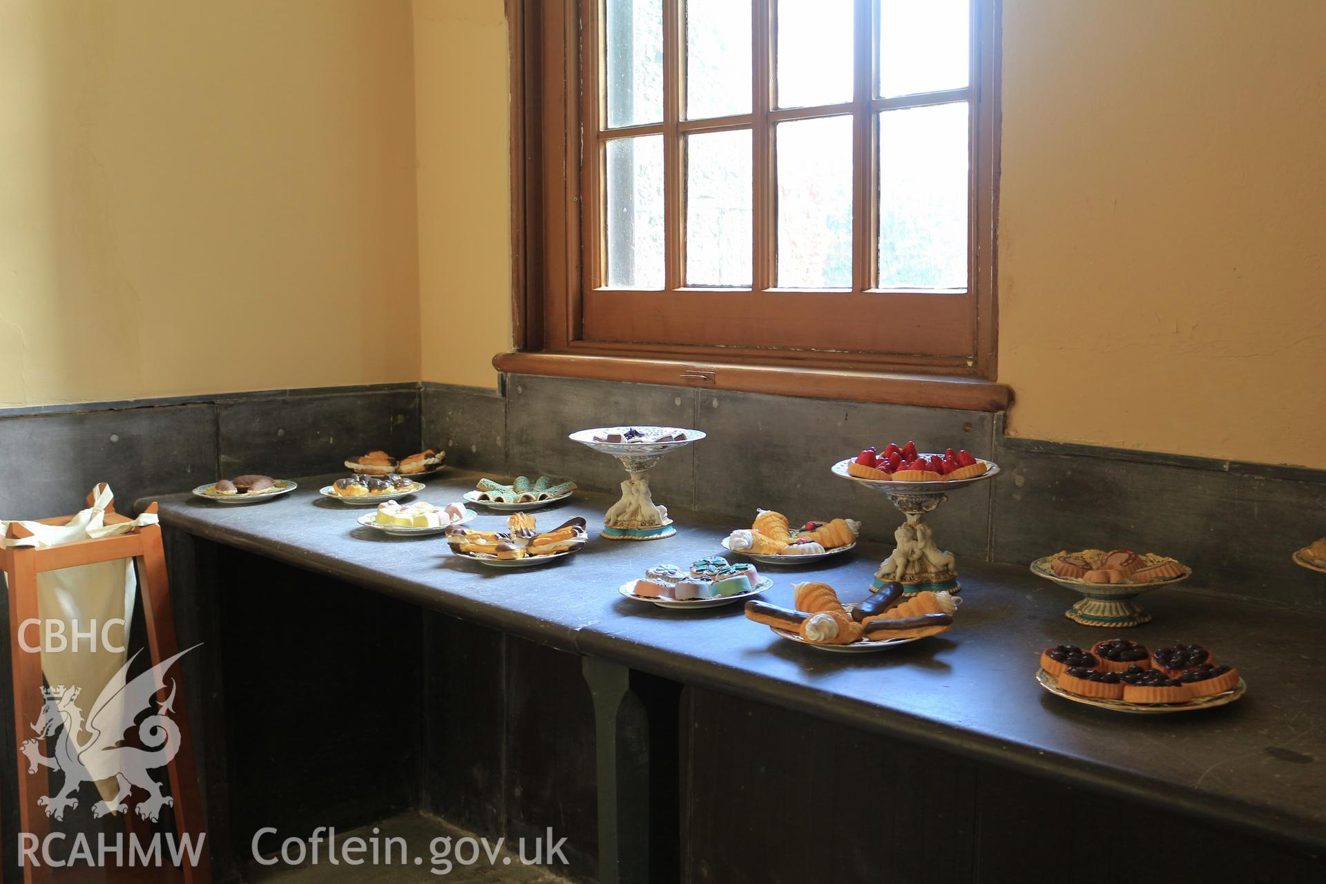 Photographic survey of Penrhyn Castle, Bangor Kitchens, display of desserts (wax models)