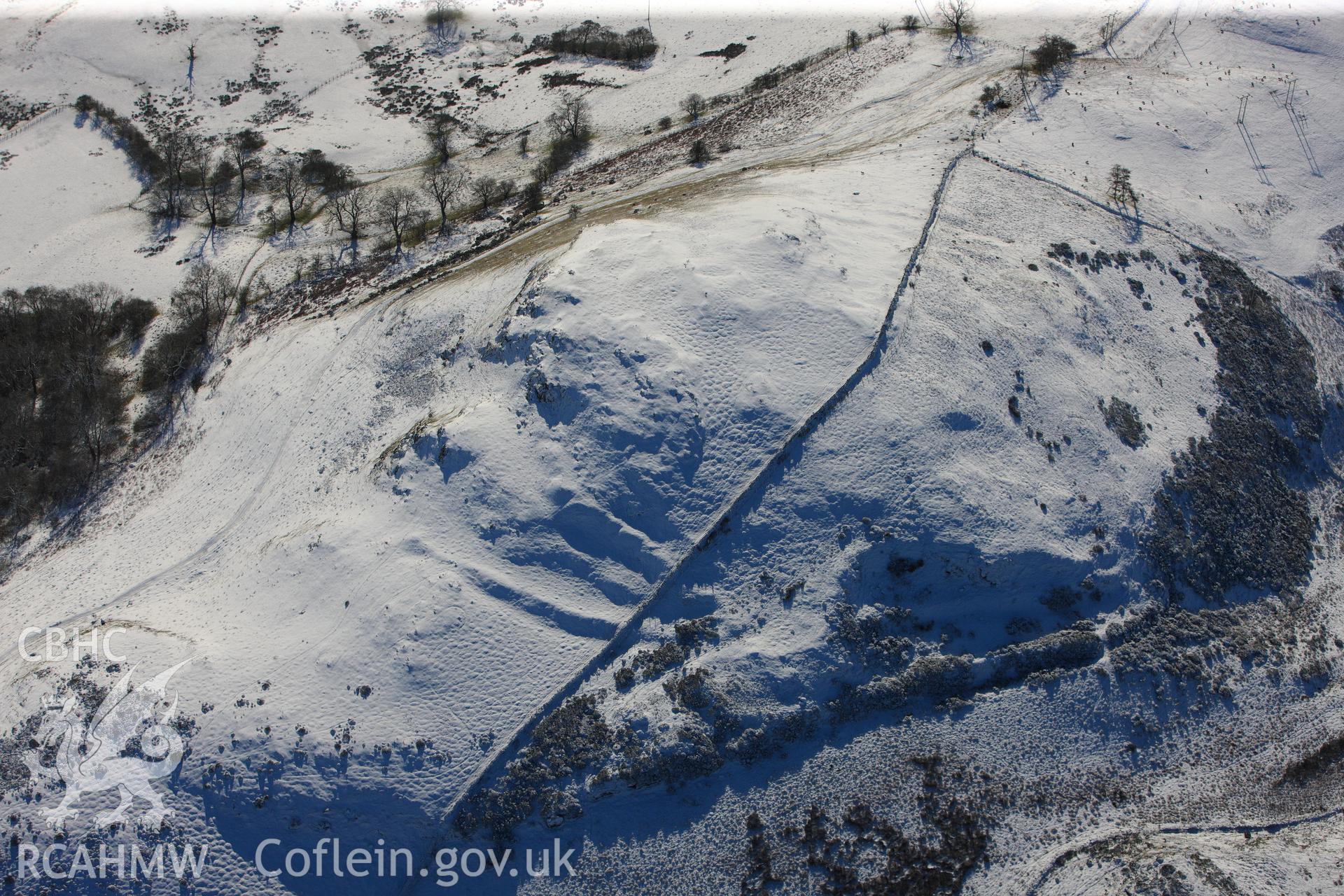 Gaer Fawr defended enclosure, Llanelwedd. Oblique aerial photograph taken during the Royal Commission?s programme of archaeological aerial reconnaissance by Toby Driver on 15th January 2013.