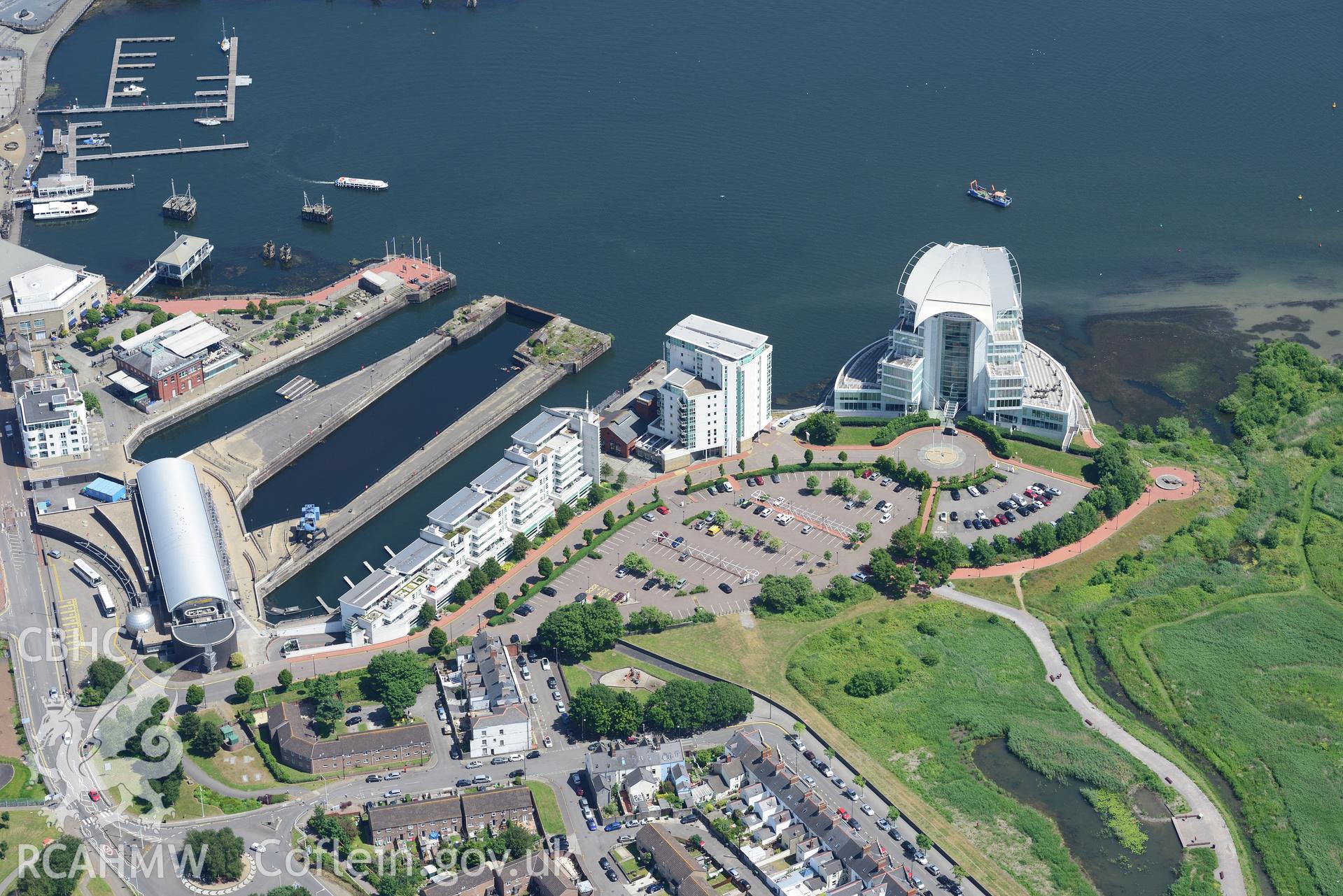 Techniquest and the St. David's Hotel, Cardiff Bay. Oblique aerial photograph taken during the Royal Commission's programme of archaeological aerial reconnaissance by Toby Driver on 29th June 2015.
