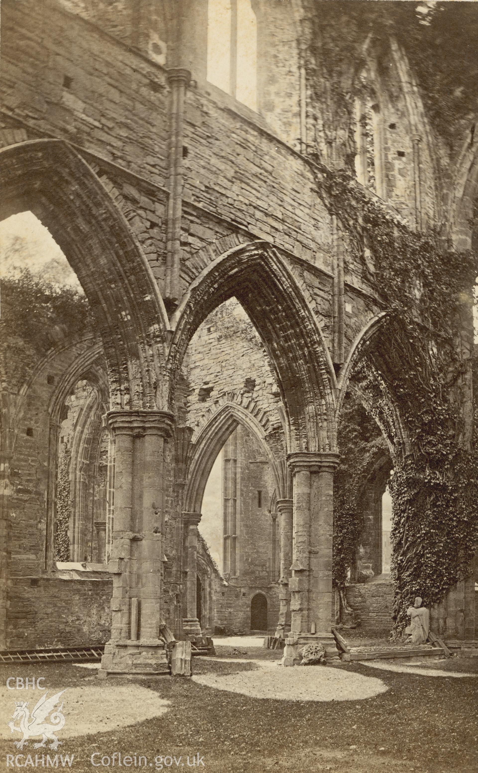Digital copy of a circa 1870 albumen print of an interior view of Tintern Abbey showing chancel arcade.