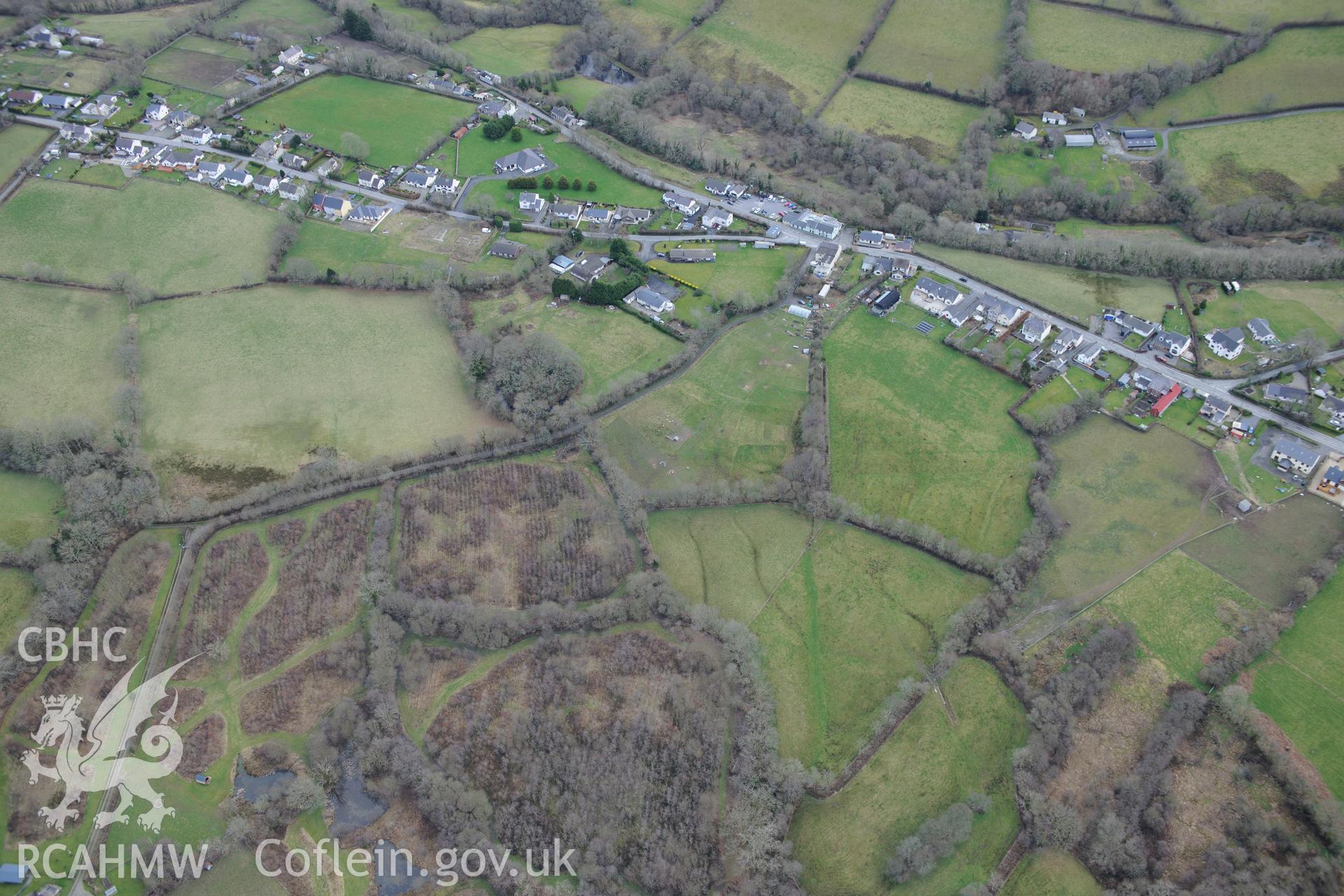 Castell Nant-y-Garan motte, Penrhiw-llan, between Newcastle Emlyn and Llandysul. Oblique aerial photograph taken during the Royal Commission's programme of archaeological aerial reconnaissance by Toby Driver on 13th March 2015.