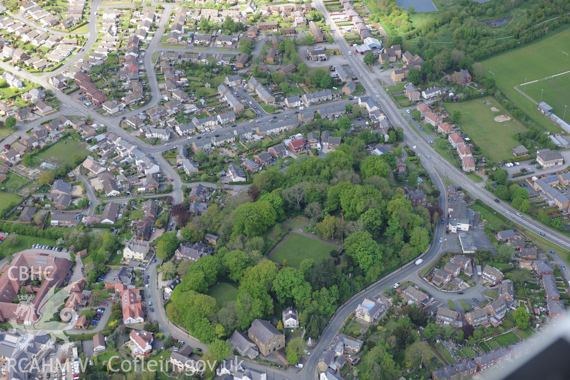 The town of Mold, with Mold Castle and Pendref Welsh Weslseyan Methodist Church visible. Oblique aerial photograph taken during the Royal Commission?s programme of archaeological aerial reconnaissance by Toby Driver on 22nd May 2013.