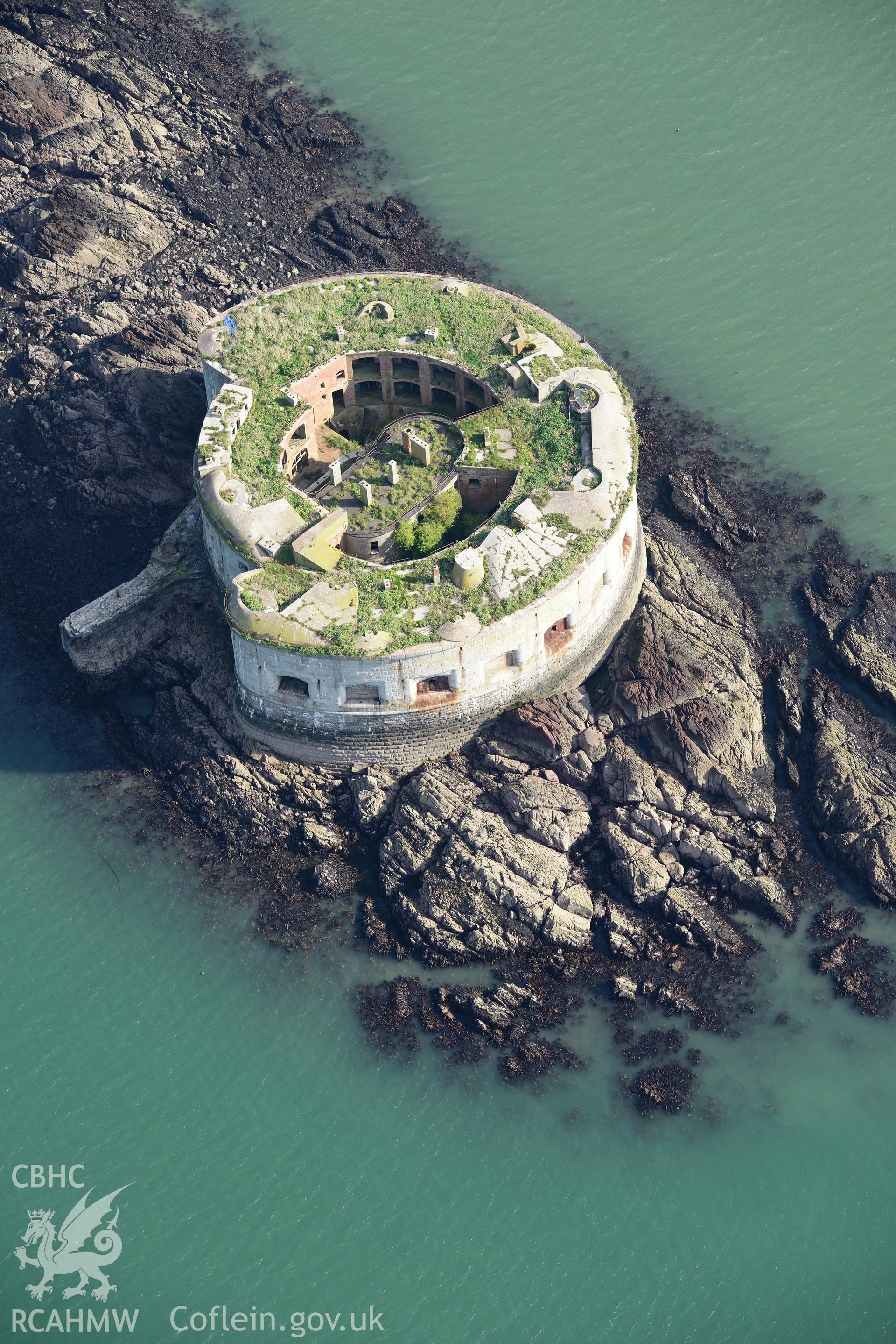Stack Rock Fort, Milford Haven. Oblique aerial photograph taken during the Royal Commission's programme of archaeological aerial reconnaissance by Toby Driver on 30th September 2015.