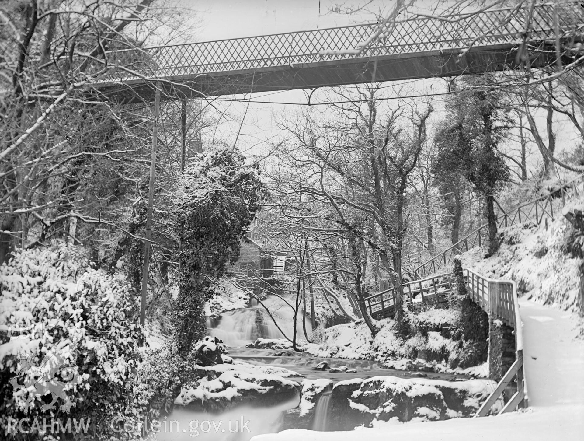Digital copy of a glass plate showing view of bridge over the falls in the Fairy Glen at Trefriw, taken by Manchester-based amateur photographer A. Rothwell, 1890-1910.
