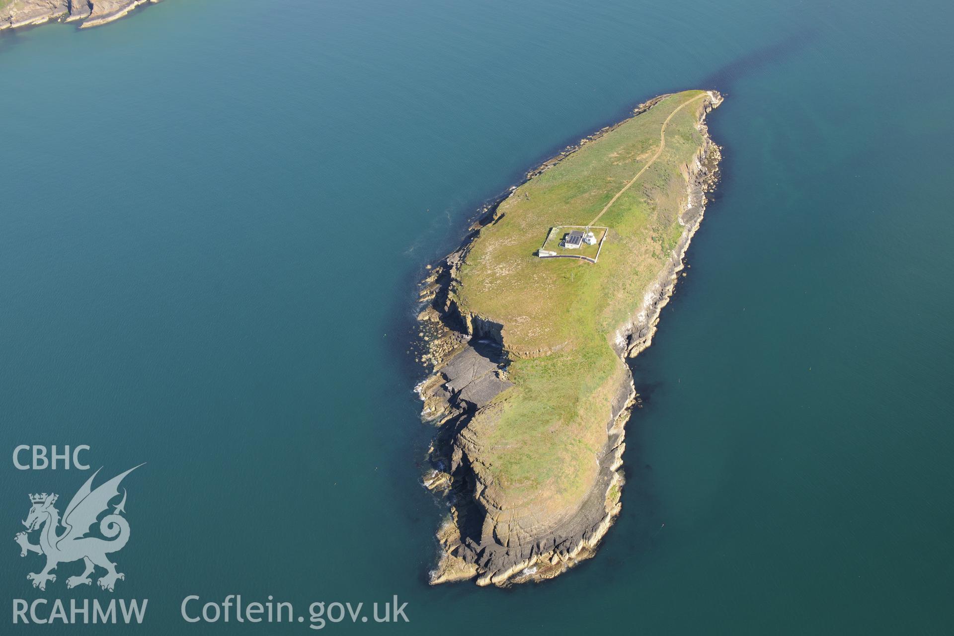 St Tudwal's Island West and its lighthouse. Oblique aerial photograph taken during the Royal Commission's programme of archaeological aerial reconnaissance by Toby Driver on 23rd June 2015.