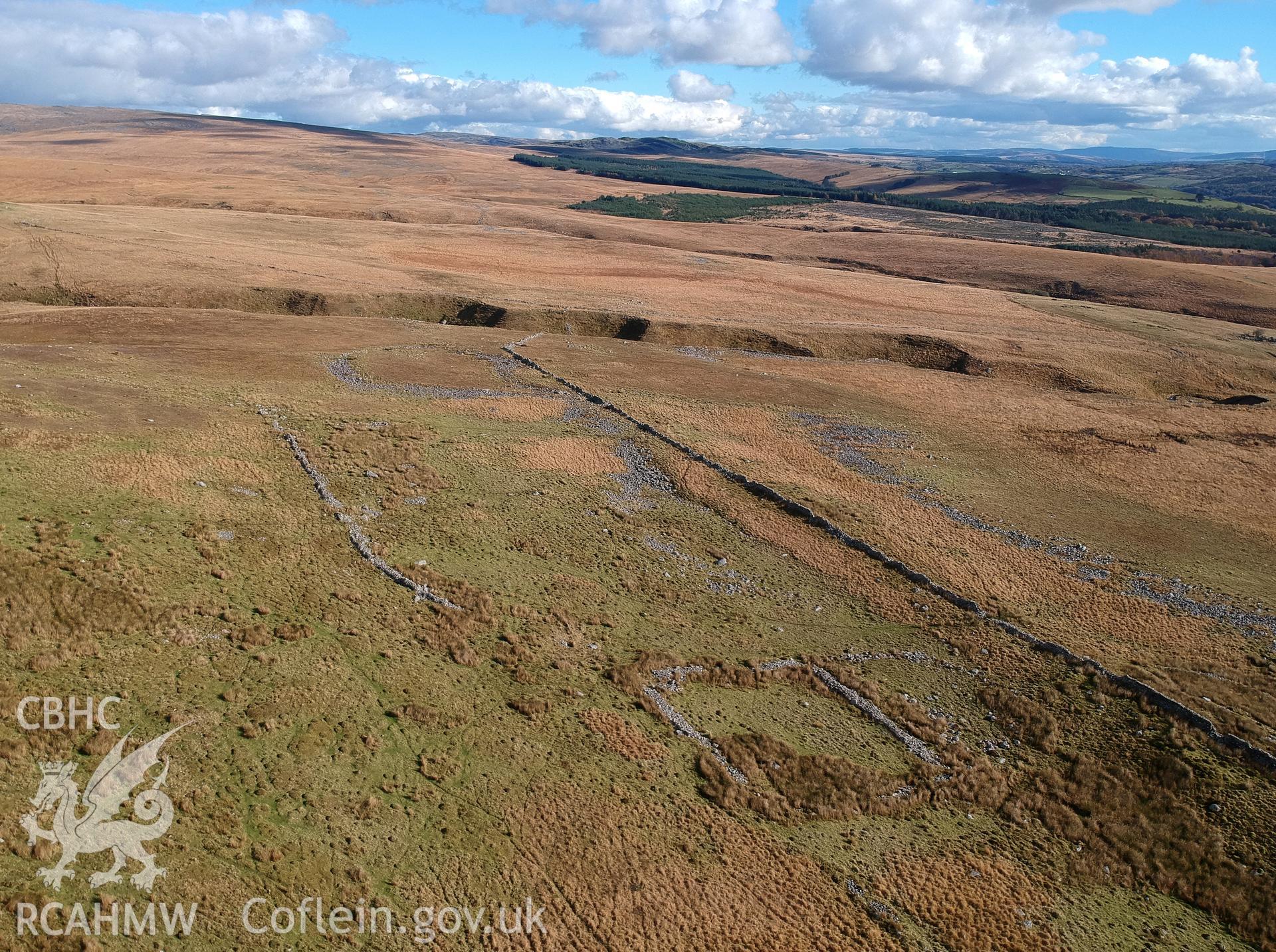 Aerial view of the Gwrs Fach enclosure group, north of Ystradgynlais. Colour photograph taken by Paul R. Davis on 1st November 2018.
